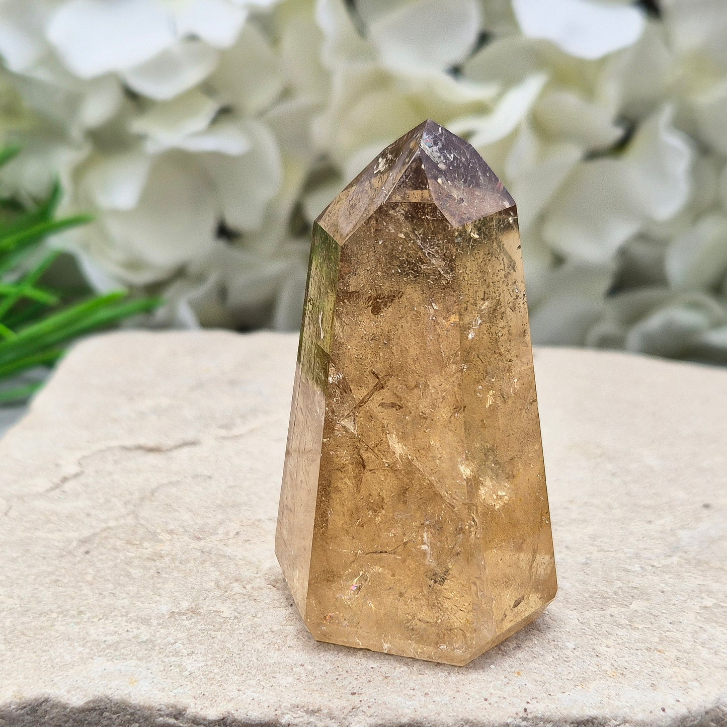Natural Untreated polished Citrine Point sourced and polished in Brazil. Wonderful dark honey citrinecolour with light reflecting inclusions.
