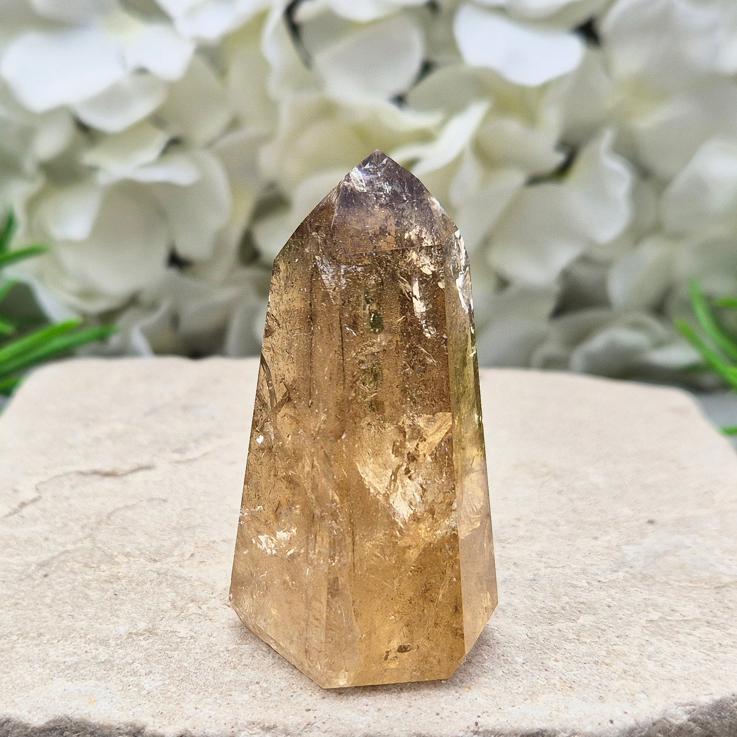 Natural Untreated polished Citrine Point sourced and polished in Brazil. Wonderful dark honey citrinecolour with light reflecting inclusions.