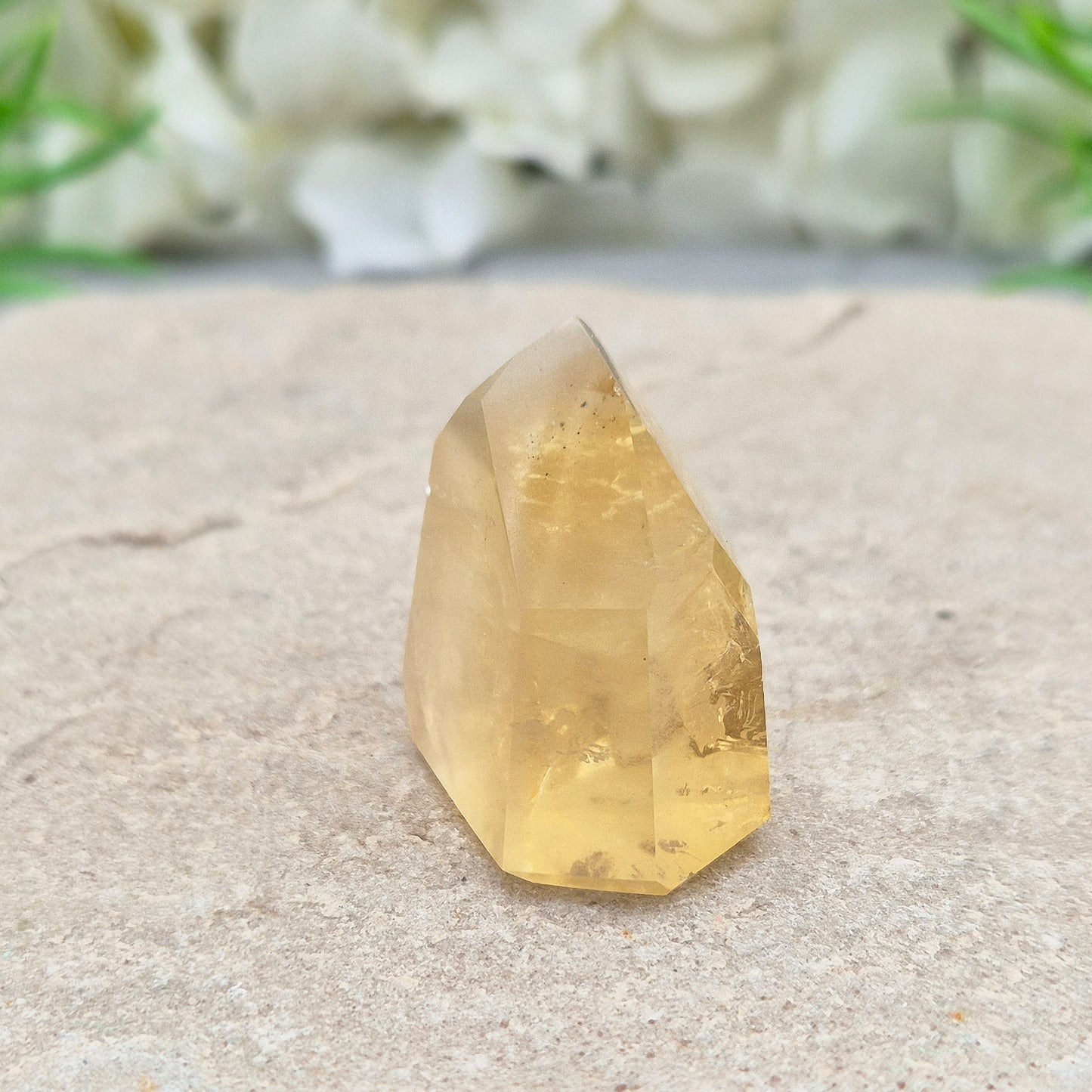 Genuine natural citrine crystal point, polished and sourced from Brazil. Ideal for crystal lovers, display, or mindful gifting.