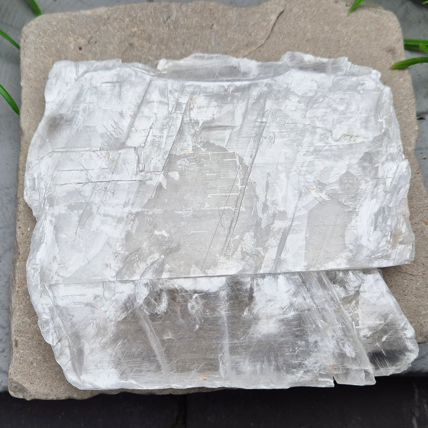 This striking Selenite Window, also known as “Utah Ice,” comes directly from the Glitter Mountain site on the Utah-Arizona border. Naturally formed with exceptional clarity and shine, these high-quality pieces are carefully selected for their purity and luminous appearance.