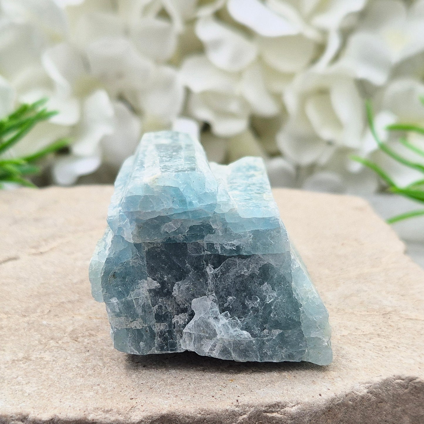 Aquamarine Crystal from India. This is a beautiful natural aqua blue aquamarine crystal. Aquamarine is a variety of blue beryl, it’s a calming and uplifting stone prized for its soothing energy.