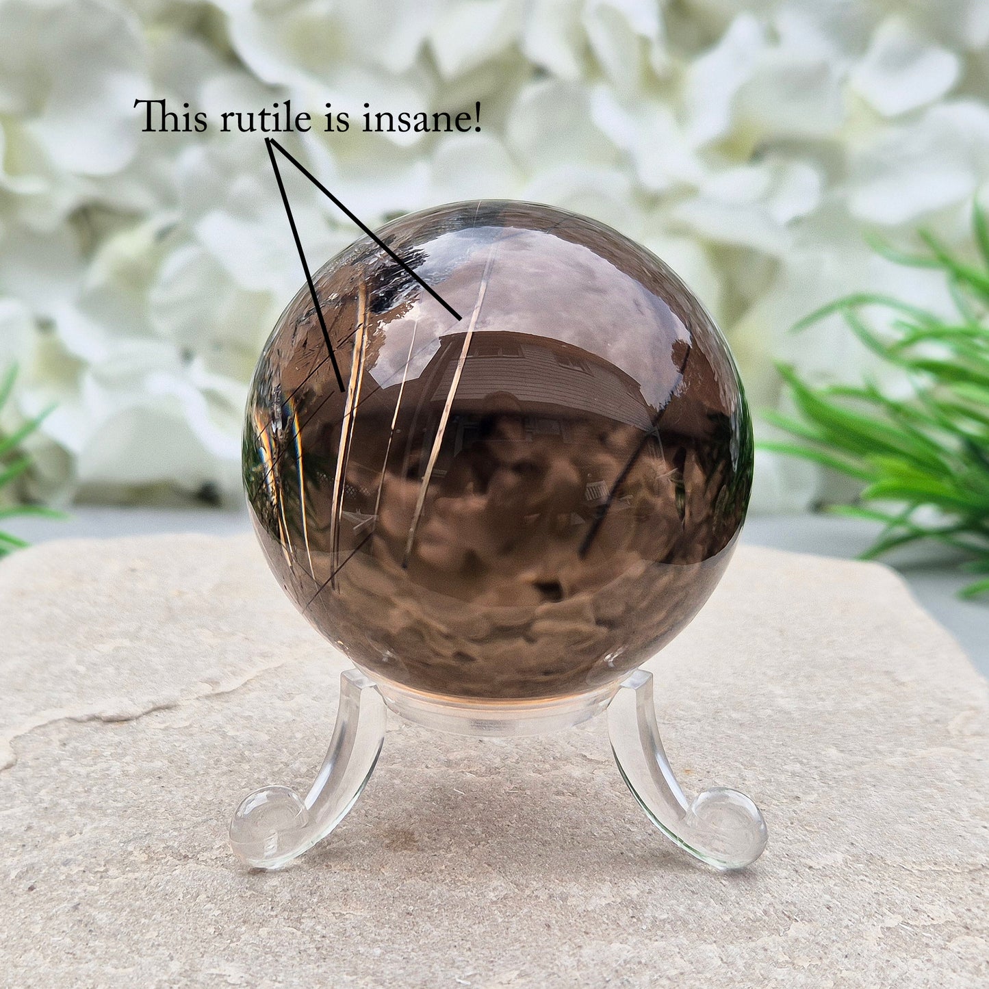 Stunning rare and collectible smoky quartz sphere, with fiery copper red rutile needles inclusions and with a rainbow flash.