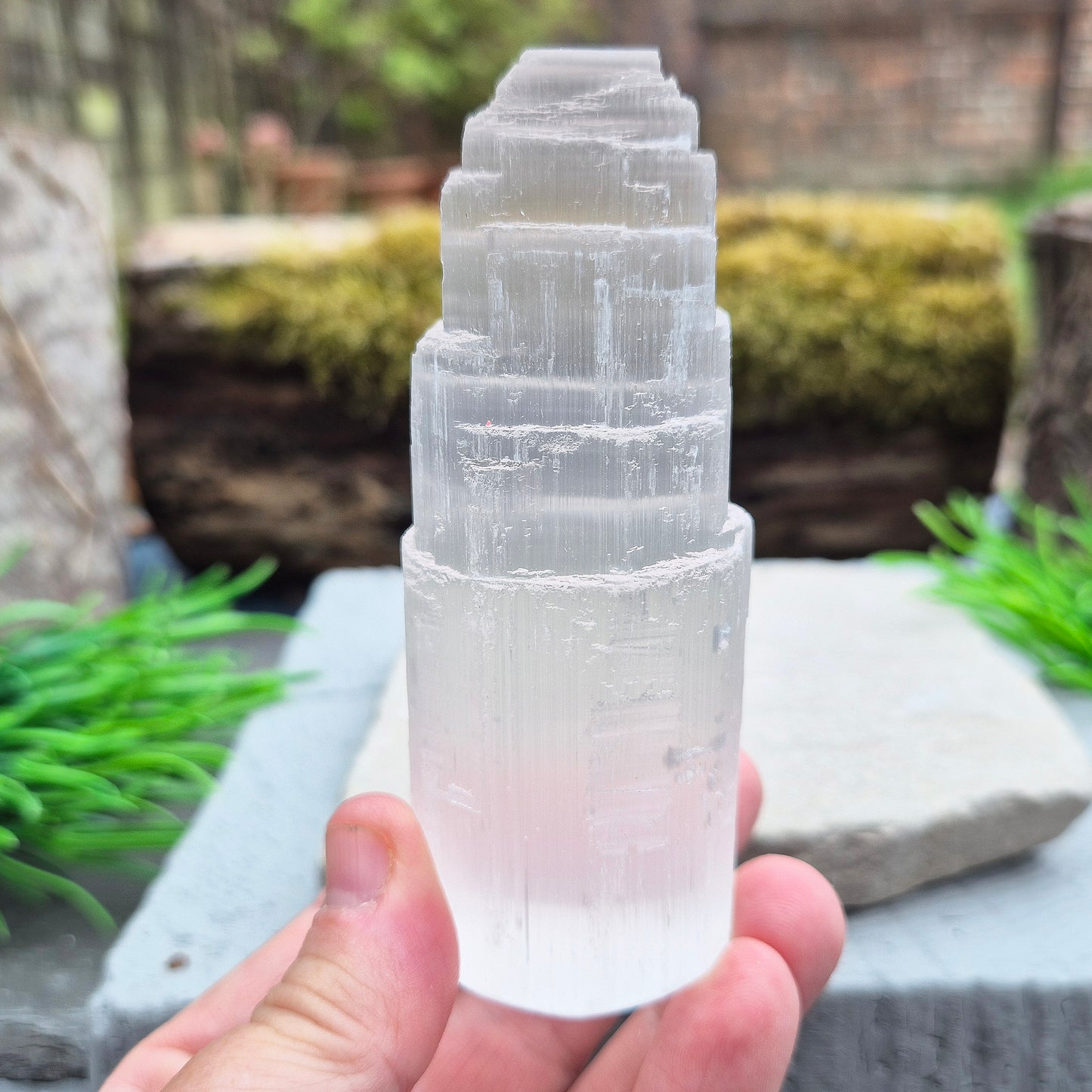 This beautiful white Selenite crystal "mountain" from Morocco is, in my opinion, one of the most essential crystals to have in any collection. I use these after energetically cleansing a room to help maintain that clean, calm atmosphere.
