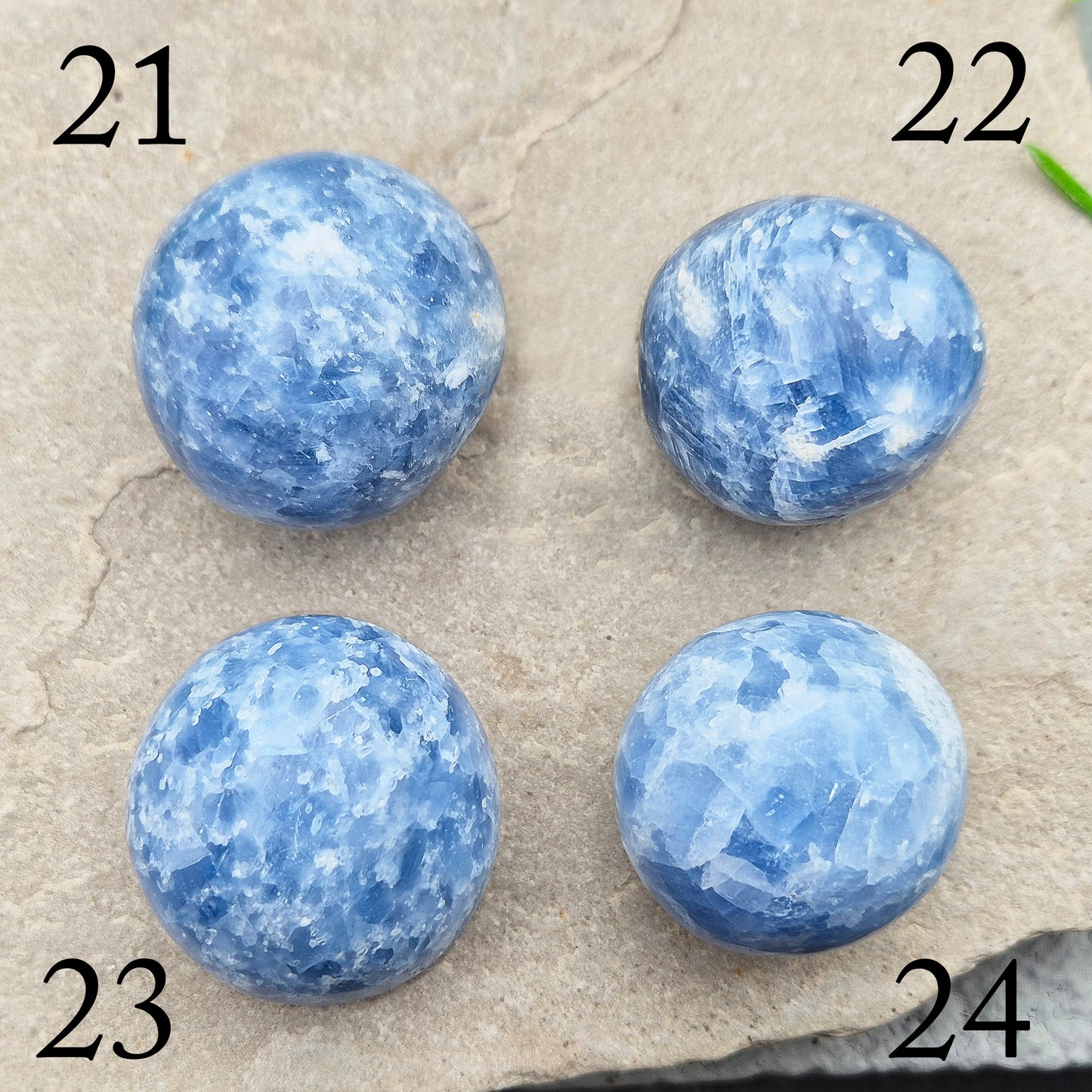 This polished Blue Calcite crystal from Madagascar has a lovely blue colouring and a rounded, gently domed shape that fits naturally into the palm. It carries a comforting, wave-like energy — peaceful, steady, and easy to be around.