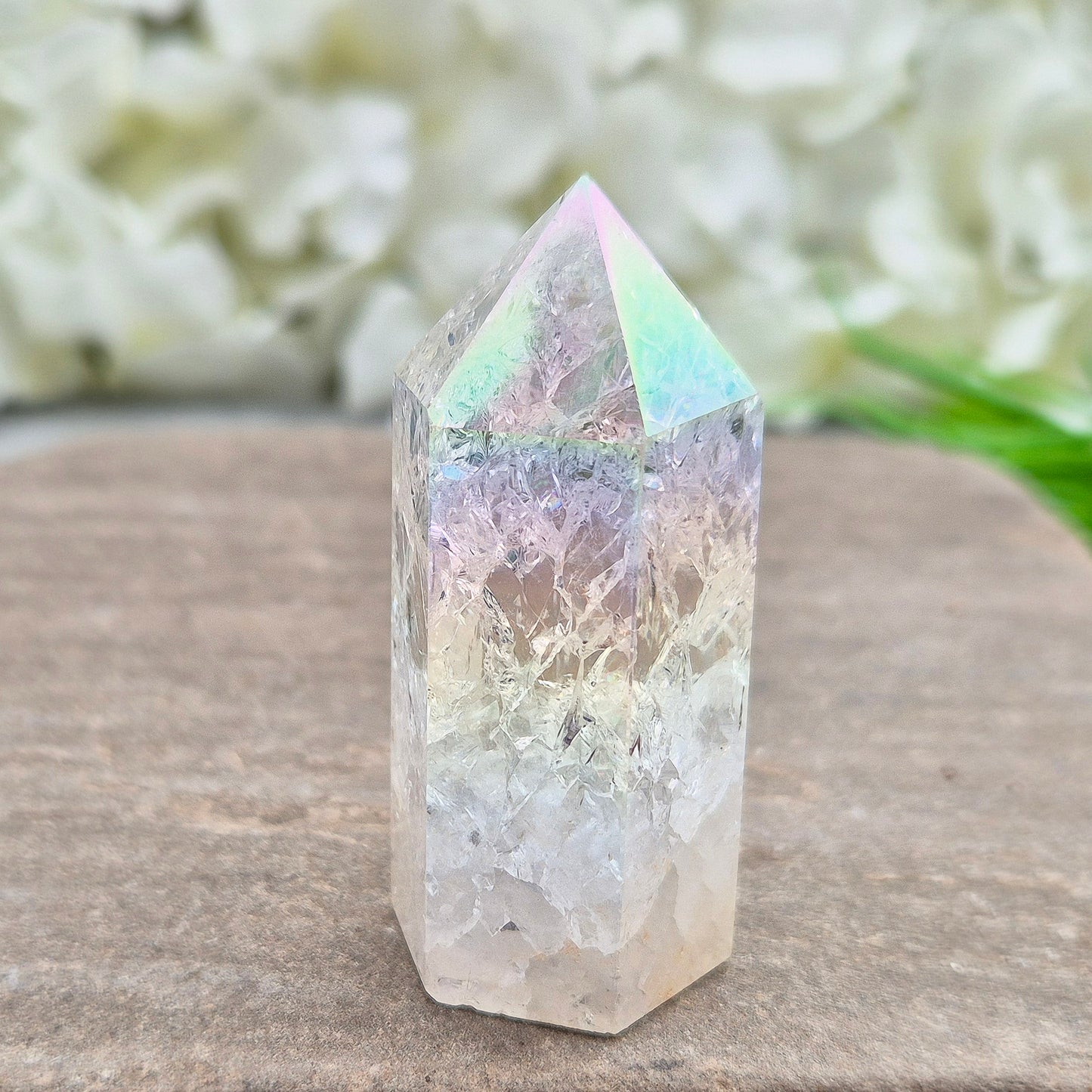 Aura Fire and Ice Quartz Polished Standing Point. Formed through the rapid heating and cooling of Quartz to create internal fracturing, then bonded with Silver and Platinum to become Angel Aura Fire and Ice, this piece radiates pure, high-frequency energy.