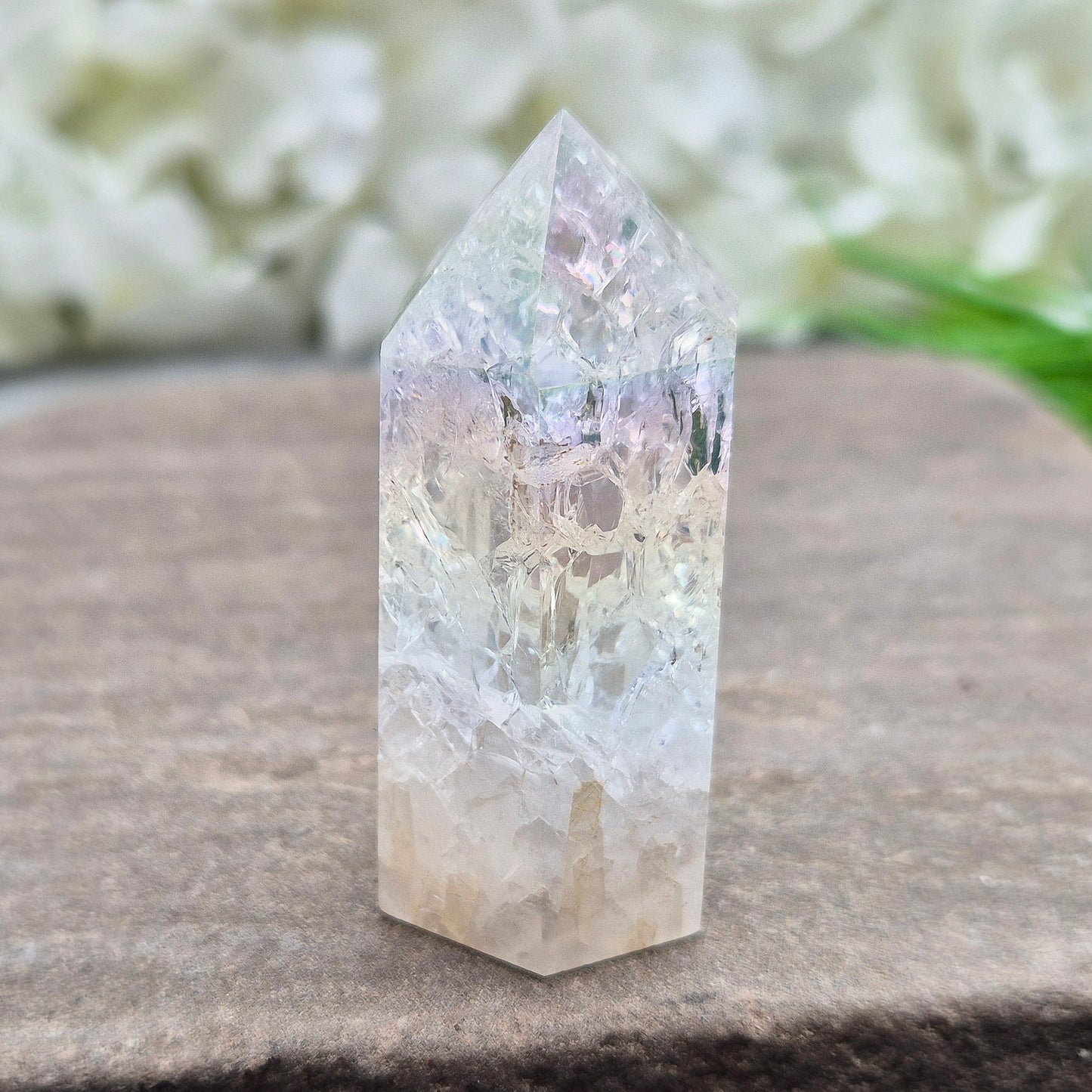 Aura Fire and Ice Quartz Polished Standing Point. Formed through the rapid heating and cooling of Quartz to create internal fracturing, then bonded with Silver and Platinum to become Angel Aura Fire and Ice, this piece radiates pure, high-frequency energy.