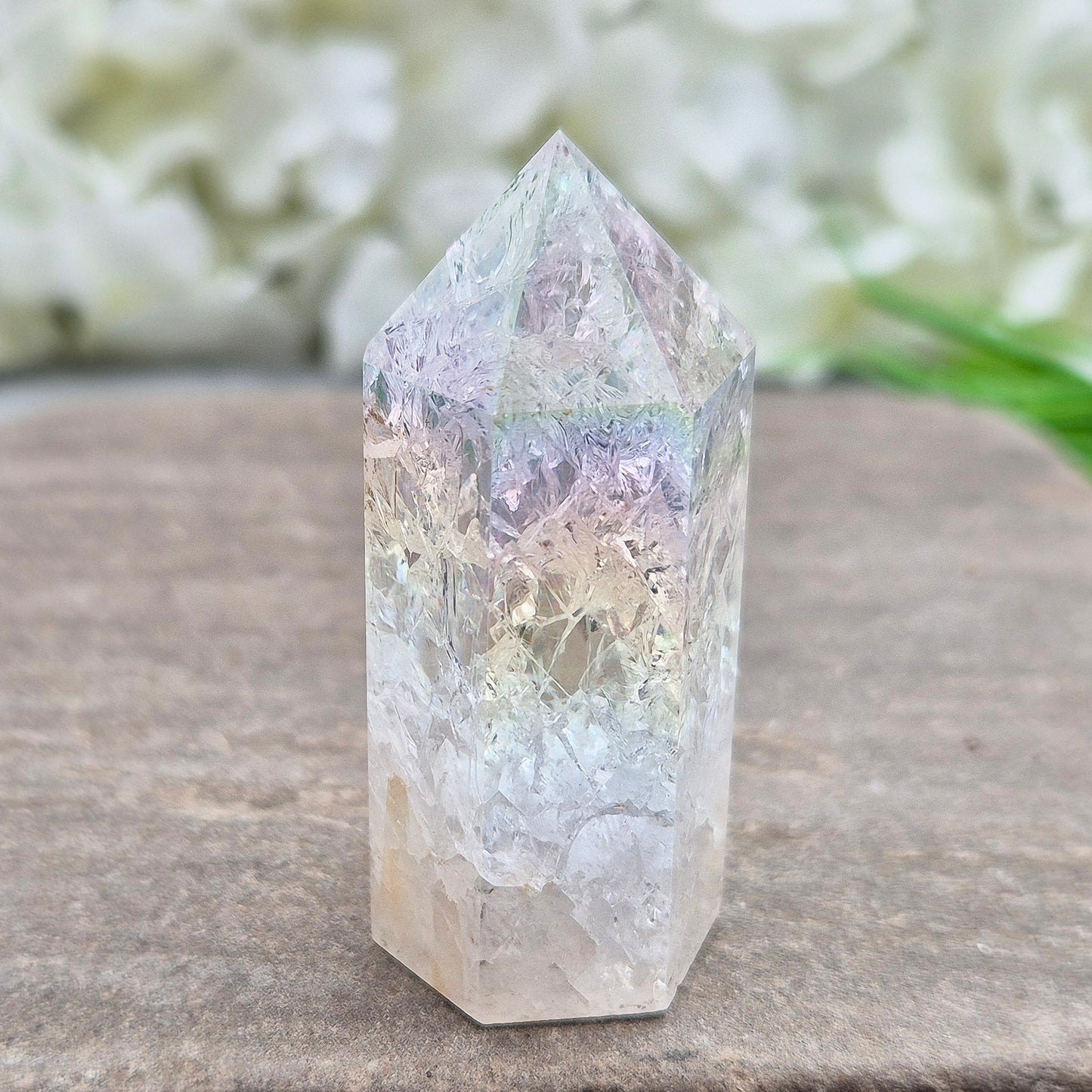 Aura Fire and Ice Quartz Polished Standing Point. Formed through the rapid heating and cooling of Quartz to create internal fracturing, then bonded with Silver and Platinum to become Angel Aura Fire and Ice, this piece radiates pure, high-frequency energy.