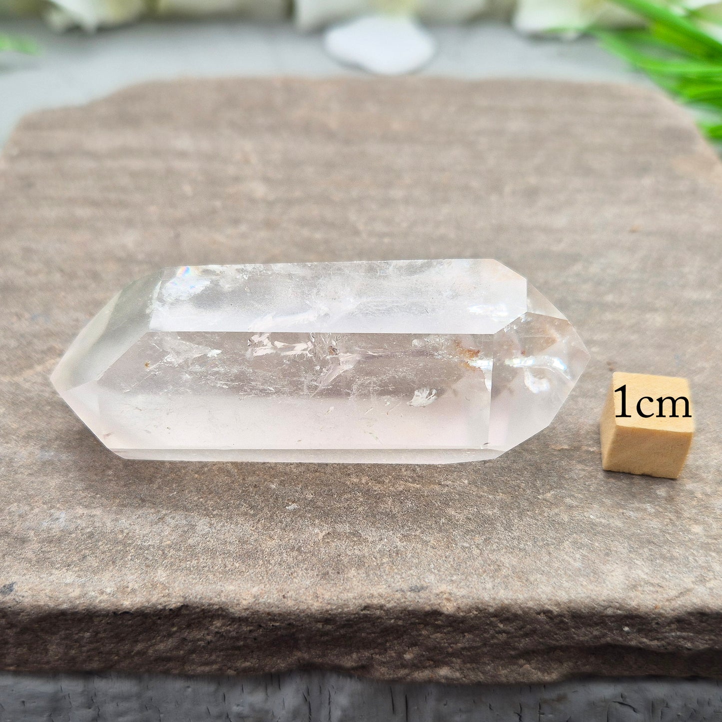 Quartz Crystal Double Terminated Wand, has a rainbow within it bringing a joyous nurturing vibration to an already great healing tool. Two sides are frosted.