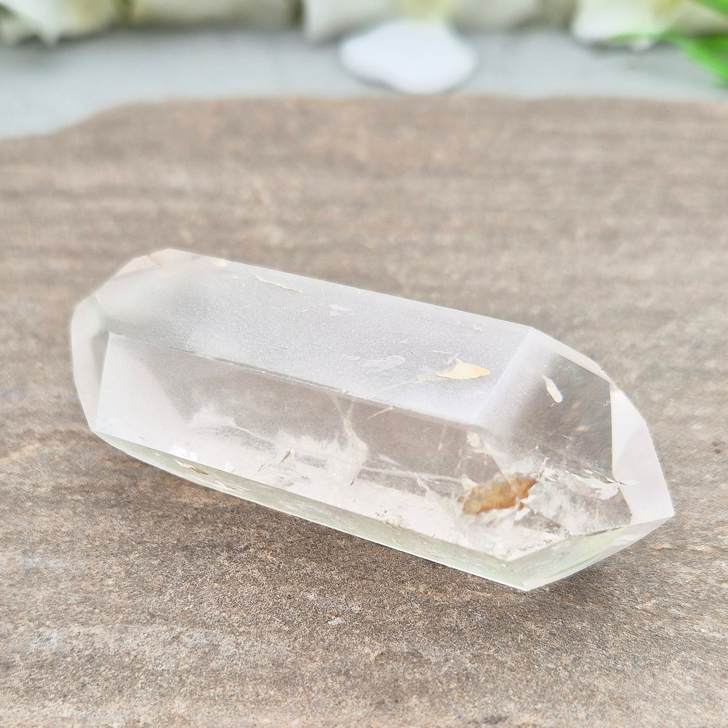 Quartz Crystal Double Terminated Wand, has a rainbow within it bringing a joyous nurturing vibration to an already great healing tool. Two sides are frosted.