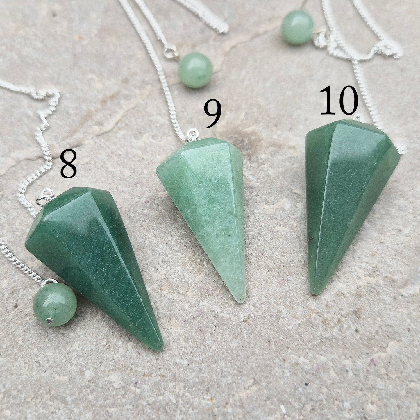 This beautiful Green Aventurine crystal pendulum features a Green Aventurine crystal pendulum and a green bead at the end of the chain.