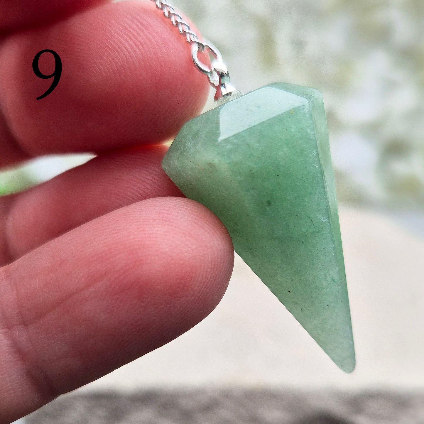 This beautiful Green Aventurine crystal pendulum features a Green Aventurine crystal pendulum and a green bead at the end of the chain.