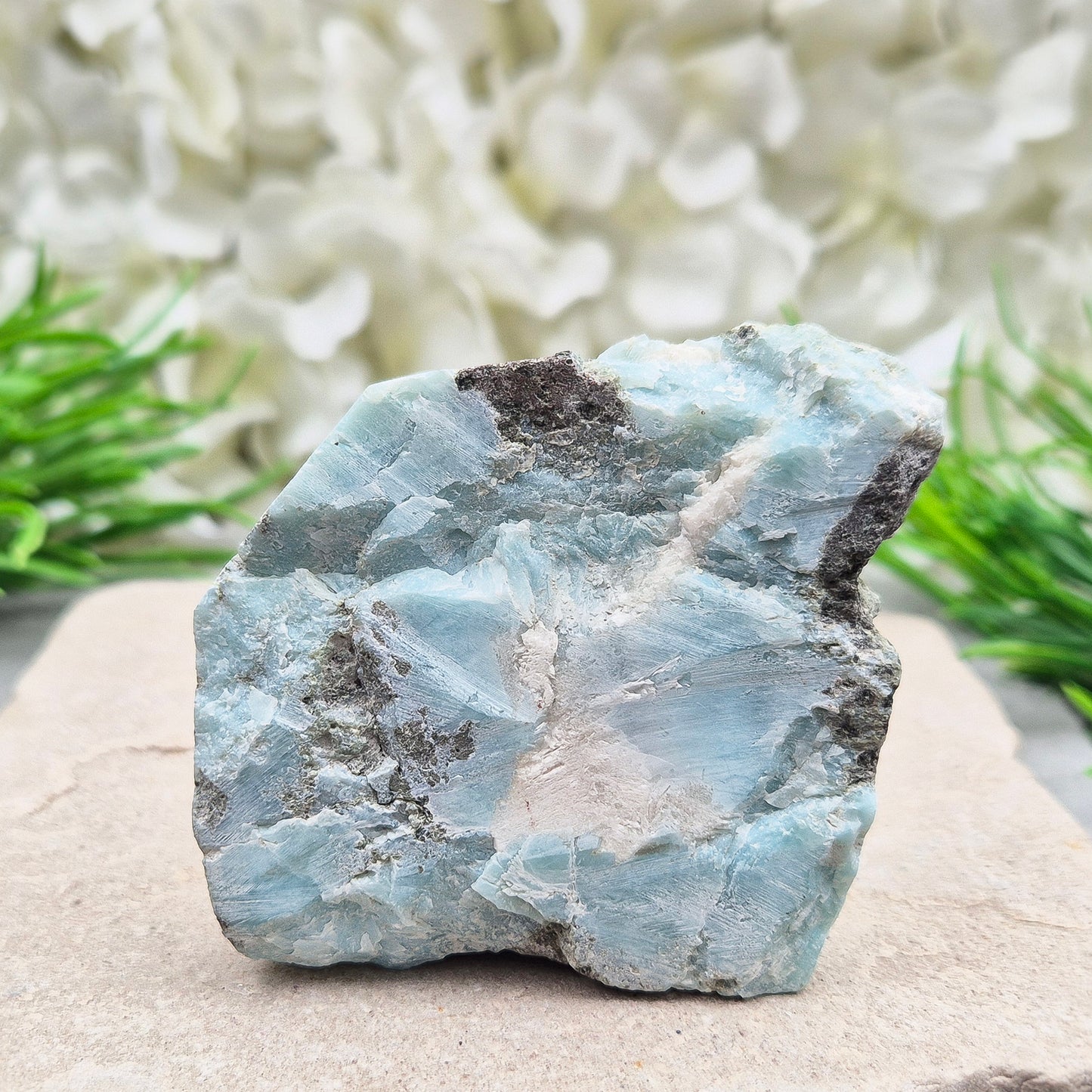 Larimar Crystal. The front of this piece is cut and flat not highly polished so keeps a natural look to it and back of this piece is natural. From Dominican Republic. Also known as Dolphin Stone, Blue Pectolite