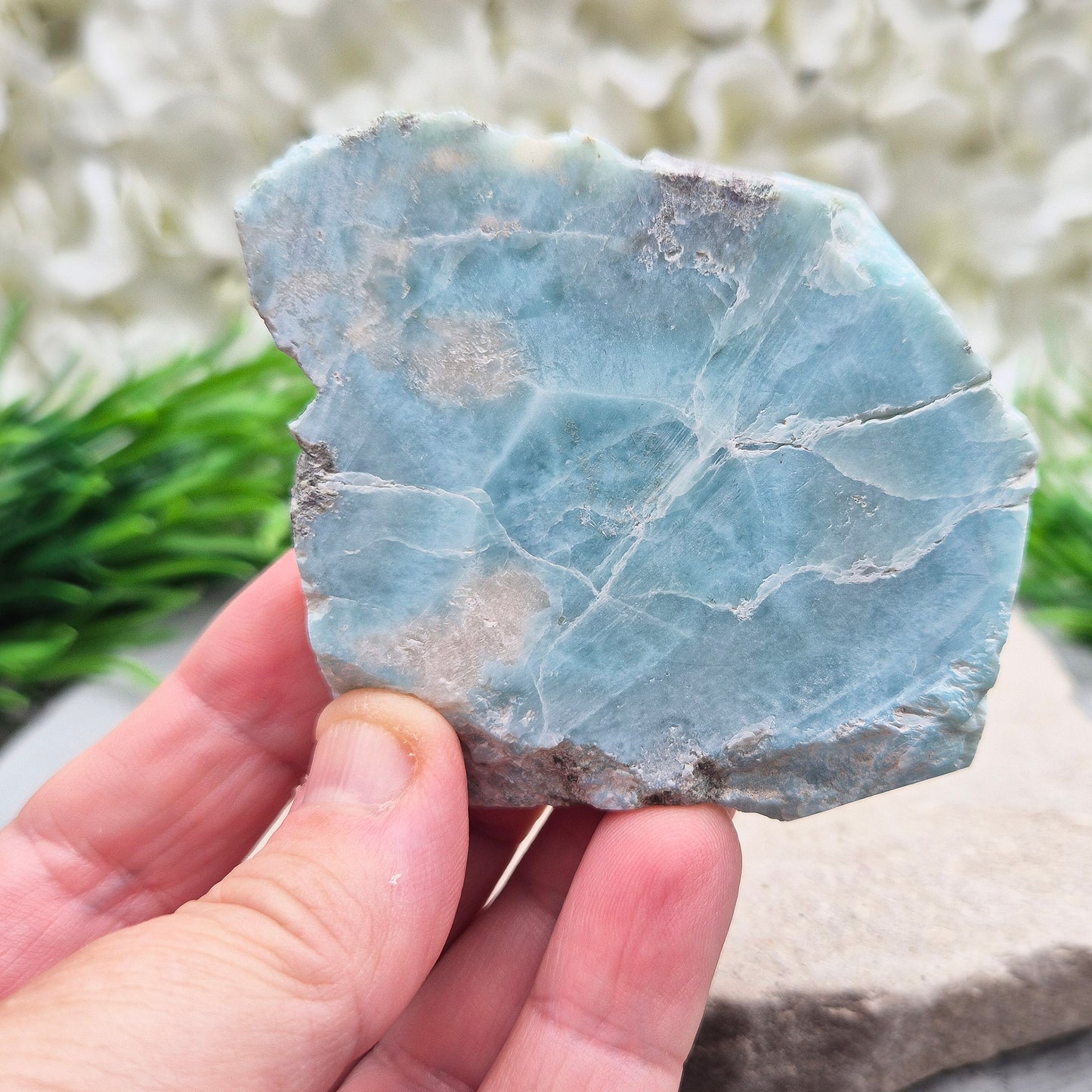 Larimar Crystal. The front of this piece is cut and flat not highly polished so keeps a natural look to it and back of this piece is natural. From Dominican Republic. Also known as Dolphin Stone, Blue Pectolite