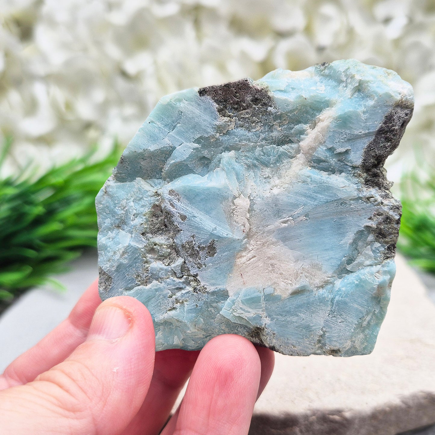 Larimar Crystal. The front of this piece is cut and flat not highly polished so keeps a natural look to it and back of this piece is natural. From Dominican Republic. Also known as Dolphin Stone, Blue Pectolite