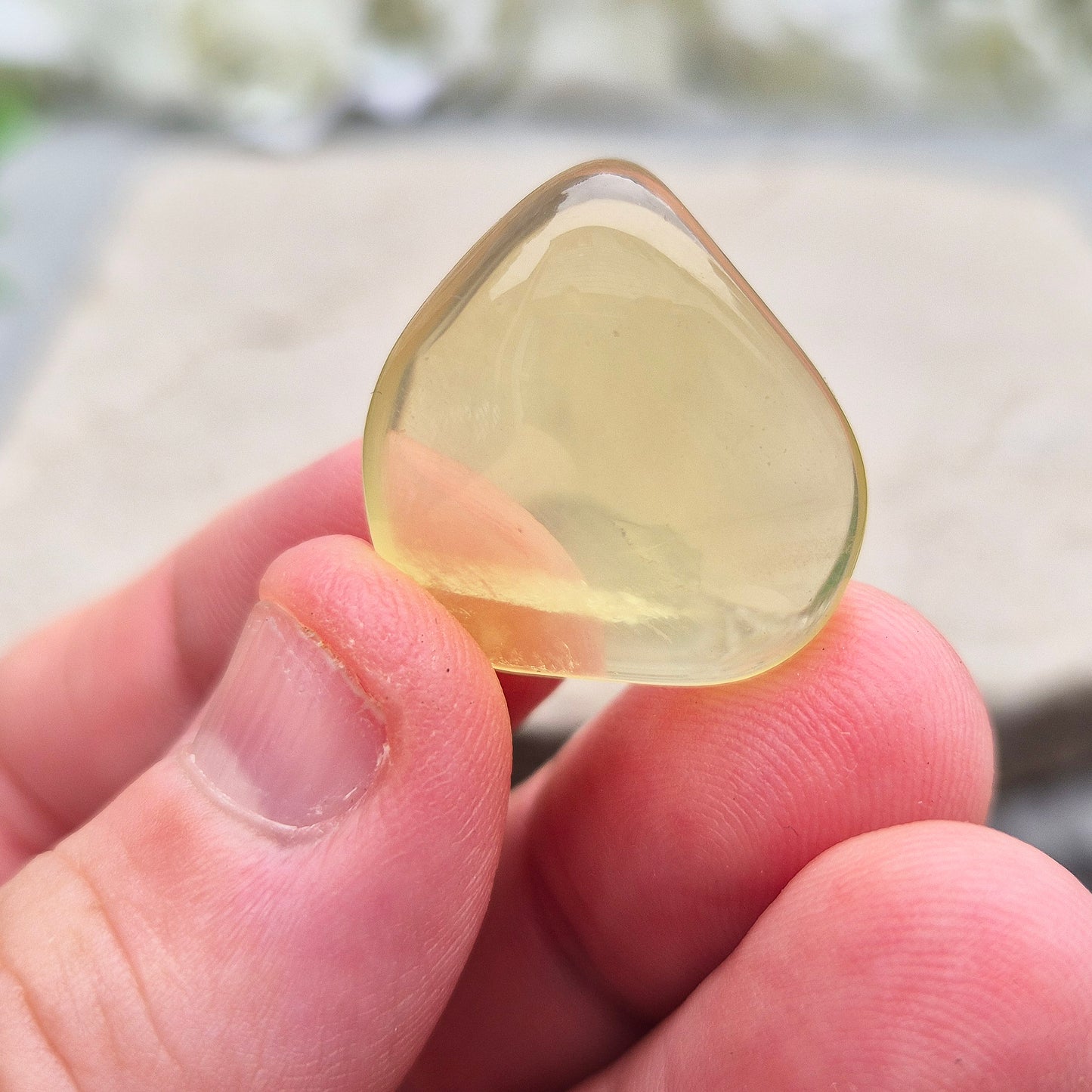 A rarer form of quartz with a distinctive olive-green tone, this Ouro Verde Quartz comes ready to display in a clear sample box (which can be removed if you prefer to carry or grid with it).