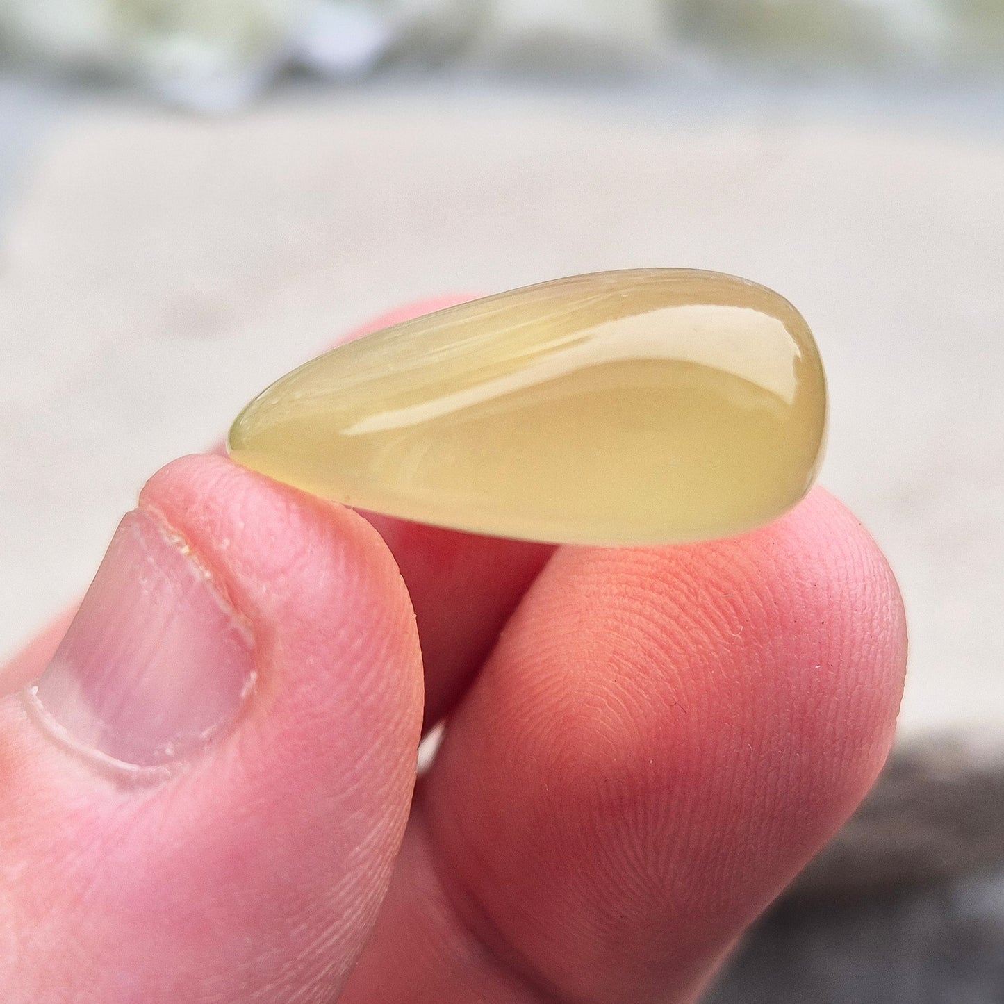 A rarer form of quartz with a distinctive olive-green tone, this Ouro Verde Quartz comes ready to display in a clear sample box (which can be removed if you prefer to carry or grid with it).