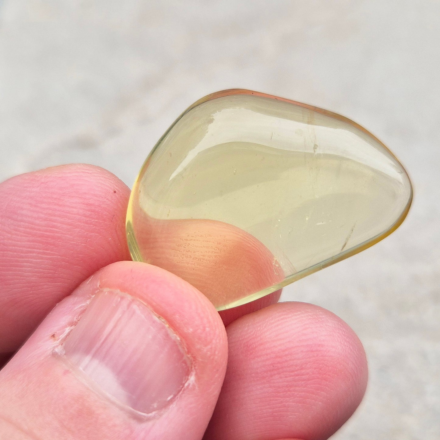 A rarer form of quartz with a distinctive olive-green tone, this Ouro Verde Quartz comes ready to display in a clear sample box (which can be removed if you prefer to carry or grid with it).