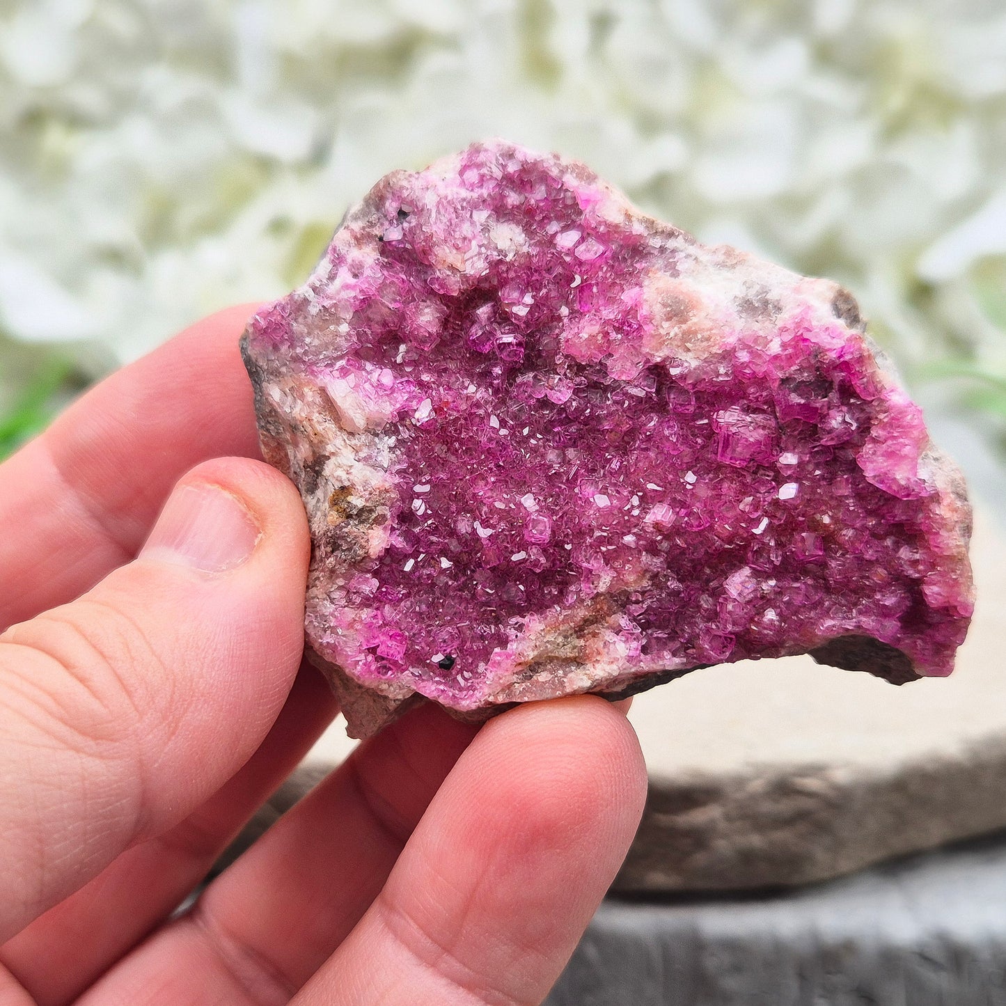 This vibrant Cobalto Calcite Cluster features sparkling fuchsia-pink crystals. This crystal is deeply connected to the heart’s energy—supporting emotional healing, loving awareness, and gentle transformation.
