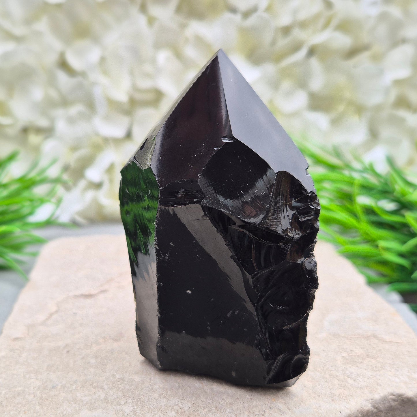 Black Obsidian Standing Point from Mexico. Polished 6 sided generator tip, natural sides and cut base. Its presence encourages clarity and focus, helping you stay centred while connecting with your inner guidance.