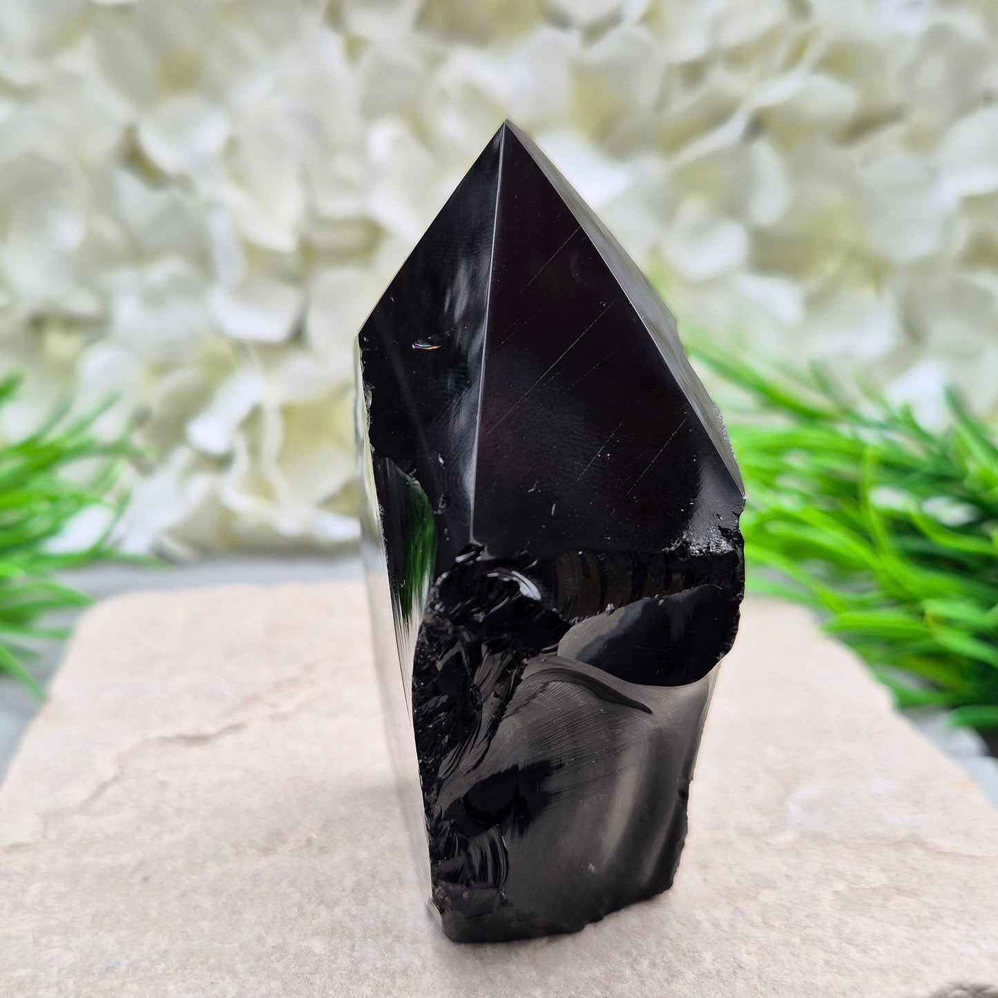 Black Obsidian Standing Point from Mexico. Polished 6 sided generator tip, natural sides and cut base. Its presence encourages clarity and focus, helping you stay centred while connecting with your inner guidance.