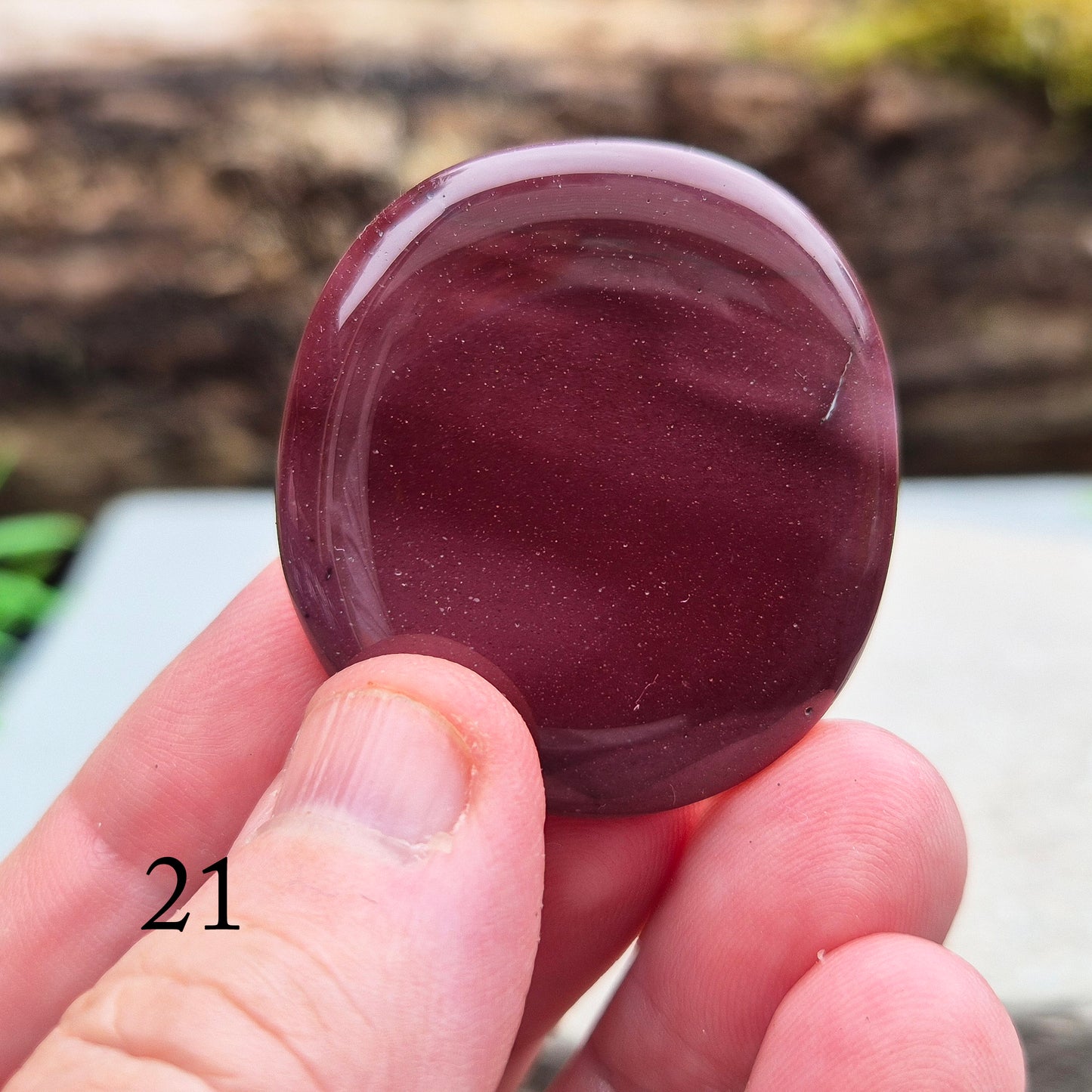 Mookaite Crystal Palm Stone. From the Mooka Creek region in Western Australia, each Mookaite palm stone displays a unique mix of earthy tones—reds, yellows, creams, and purples.