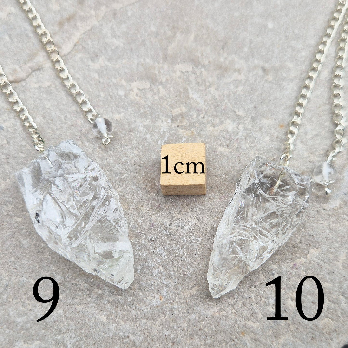 This Rock Quartz Crystal Pendulum from Brazil features a natural quartz crystal and a white bead at the end of the chain. It will come with a card and pouch for safe keeping.