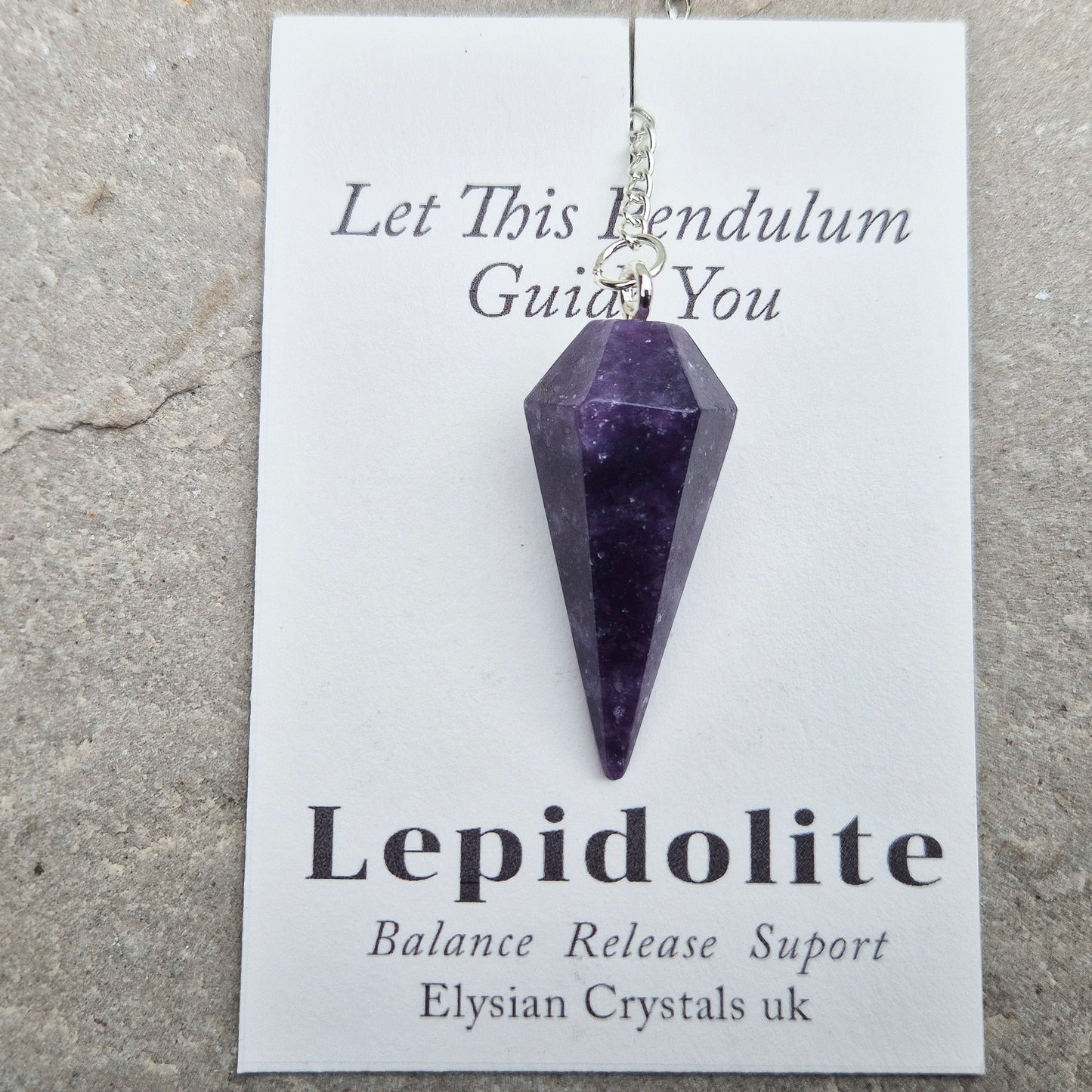 This Lepidolite Crystal Pendulum shows off beautiful deep purple colouring. Lepidolite is valued for its soothing, balancing energy – a gentle aid when working through stress, change, or emotional shifts.
