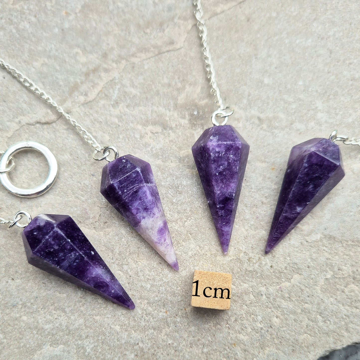 Lepidolite Crystal Pendulum | Works with the Heart, Third Eye, & Crown Chakras to enhance emotional healing and spiritual exploration.