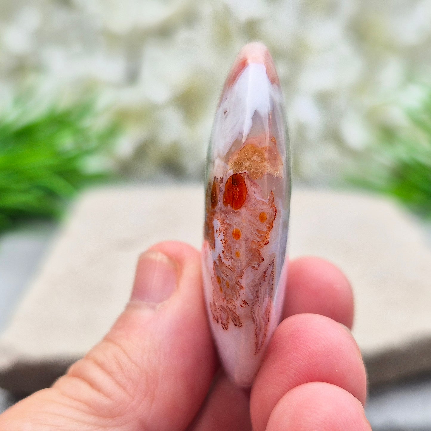 Moroccan Agate palm stone – a grounding crystal that supports calm, balance, resilience, and confidence for daily use.