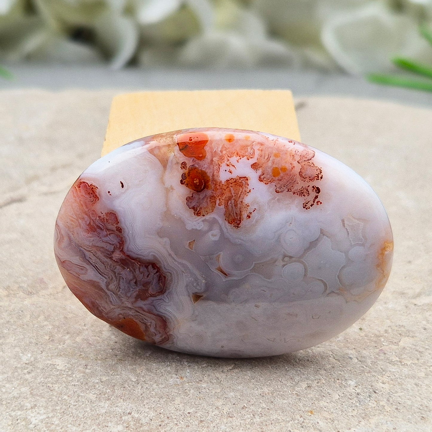 Moroccan Agate palm stone – a grounding crystal that supports calm, balance, resilience, and confidence for daily use.