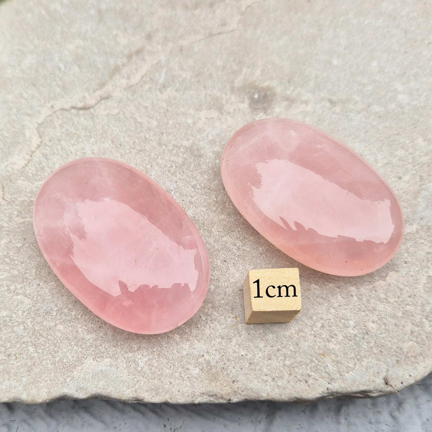 Smooth Rose Quartz palm stone for love, comfort, and emotional healing. Easy to hold, perfect for meditation, stress relief, and gentle heart energy.