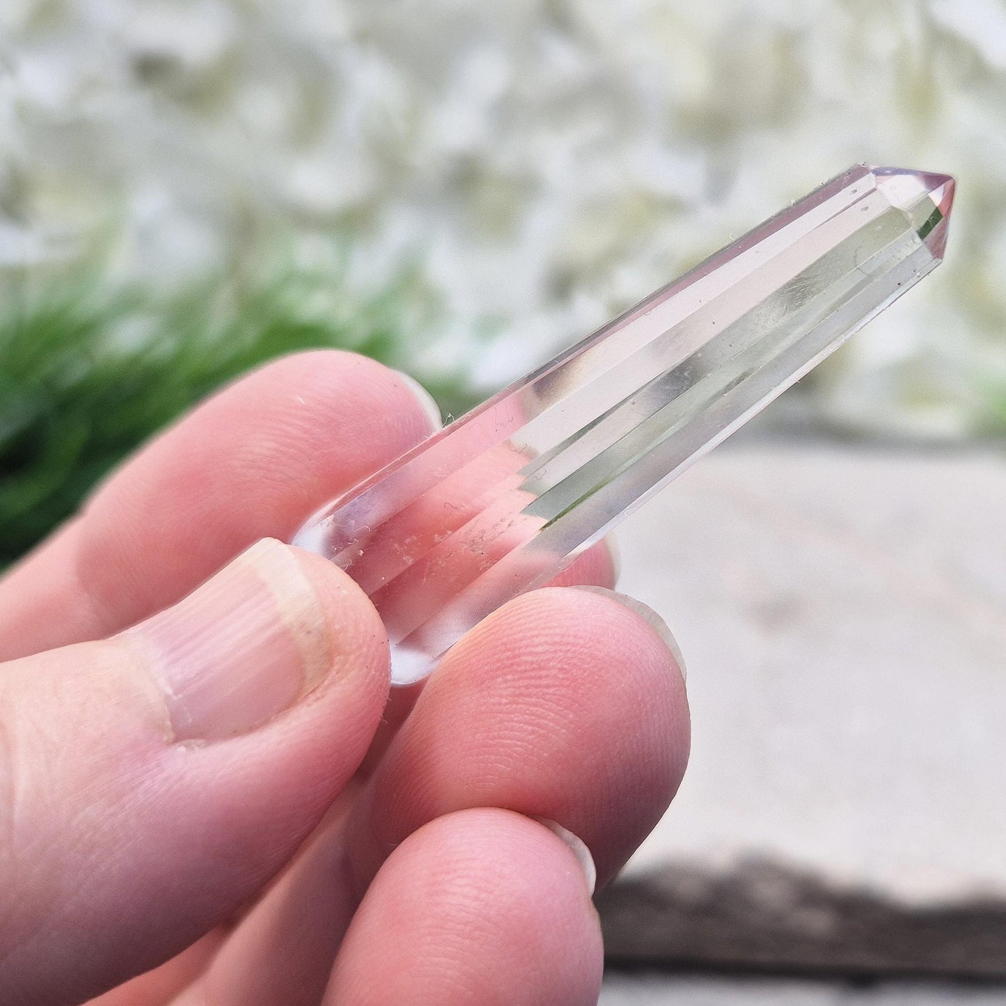 Mini Vogel Quartz wand with 12 sides, pointed tip & rounded base. A clear quartz tool for focus, alignment, meditation, and amplifying intentions.