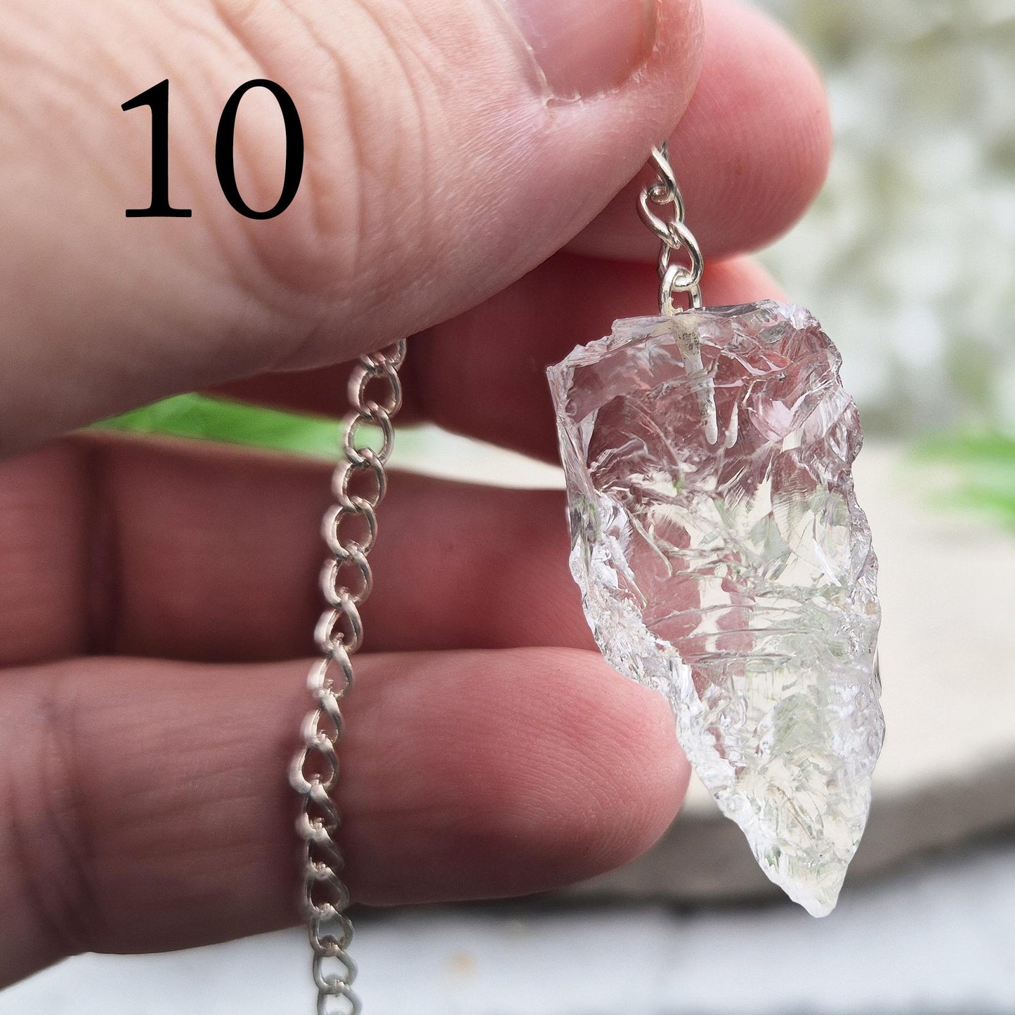 Rock Quartz crystal pendulum for dowsing, energy work, meditation, and connecting with your intuition. A beautiful tool to support focus and awareness.