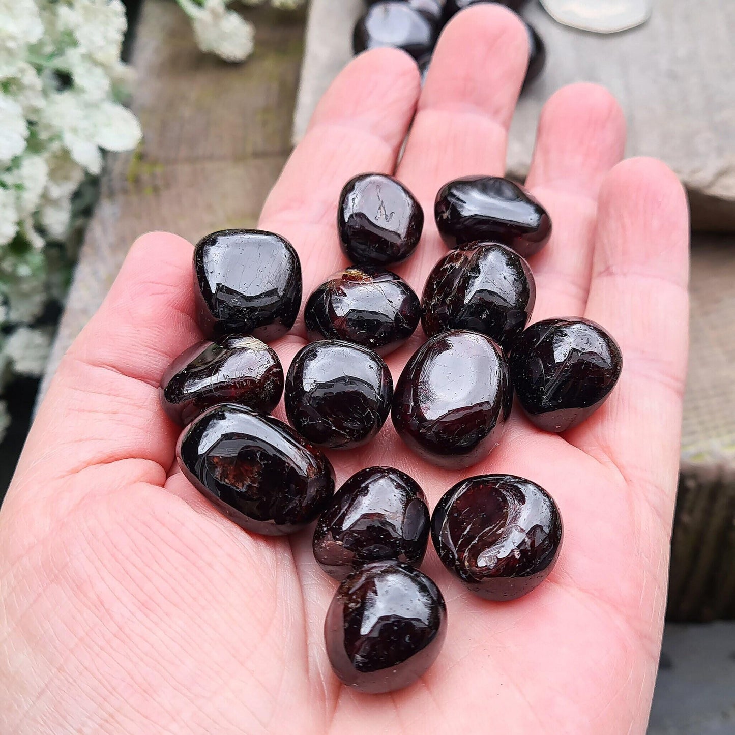 Shop polished Red Garnet crystals from India — deep redbtumbled stones, 8–15gm. Root chakra crystal for courage and motivation, love and passion.