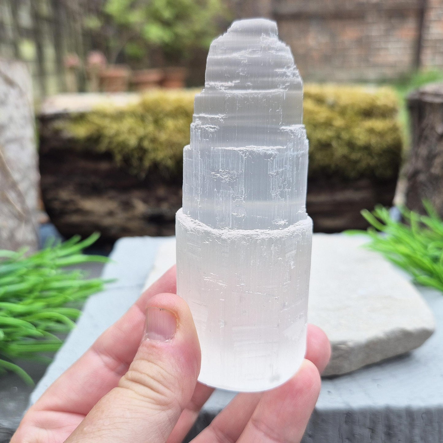 Selenite crystal tower for energy cleansing, clarity, and calm. A striking, high-vibe piece to purify spaces and raise your spiritual frequency.