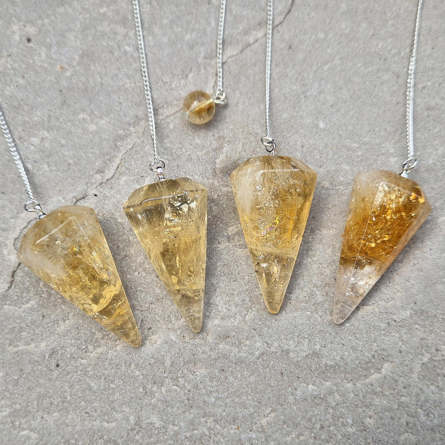 Citrine Crystal Pendulum – an uplifting tool for dowsing, energy work, and spiritual clarity. Ideal for decision-making, chakra work, and meditation.