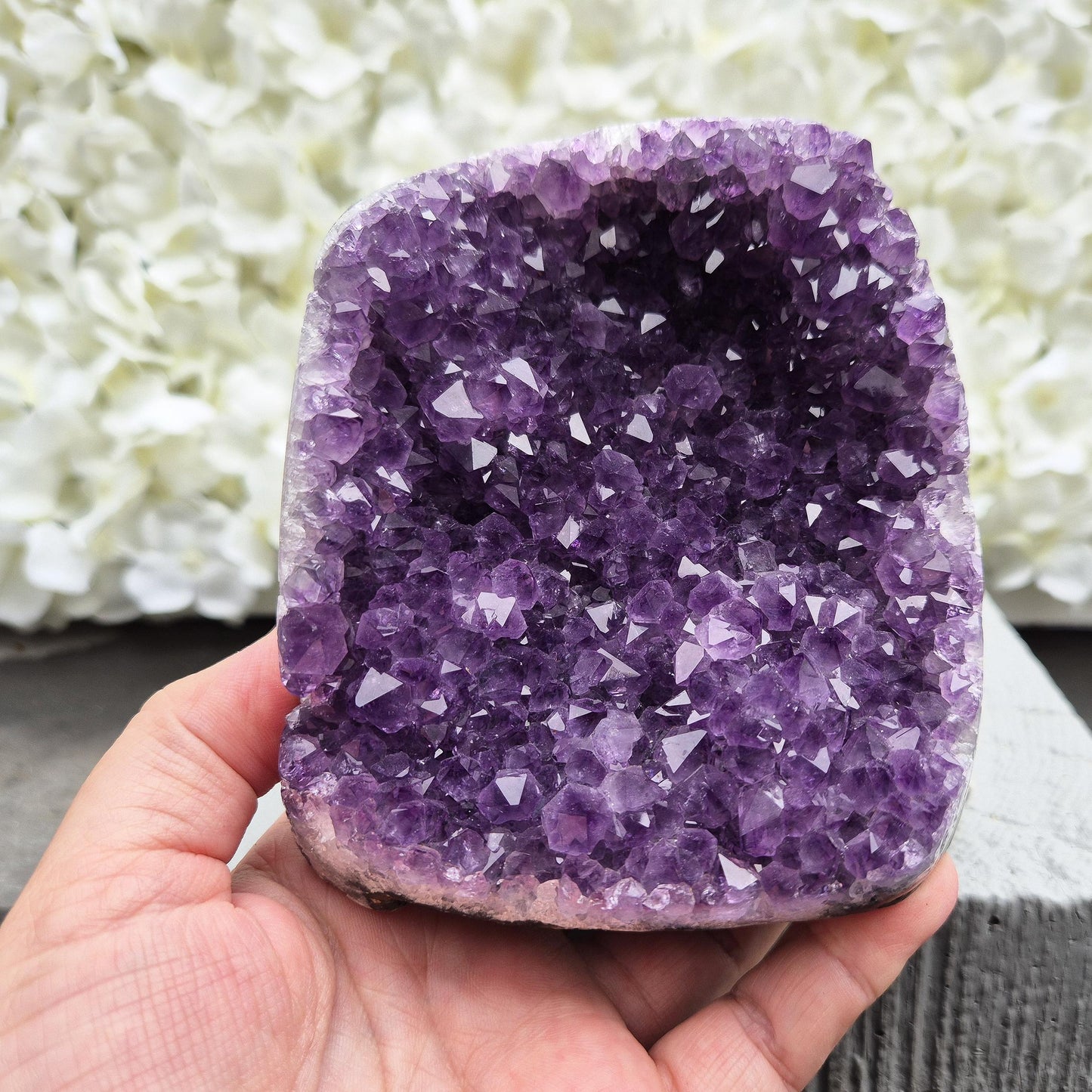 Natural Amethyst geode with deep purple crystals. Ideal for calming spaces, meditation, or display. Cleansed and ready to bring peaceful energy.