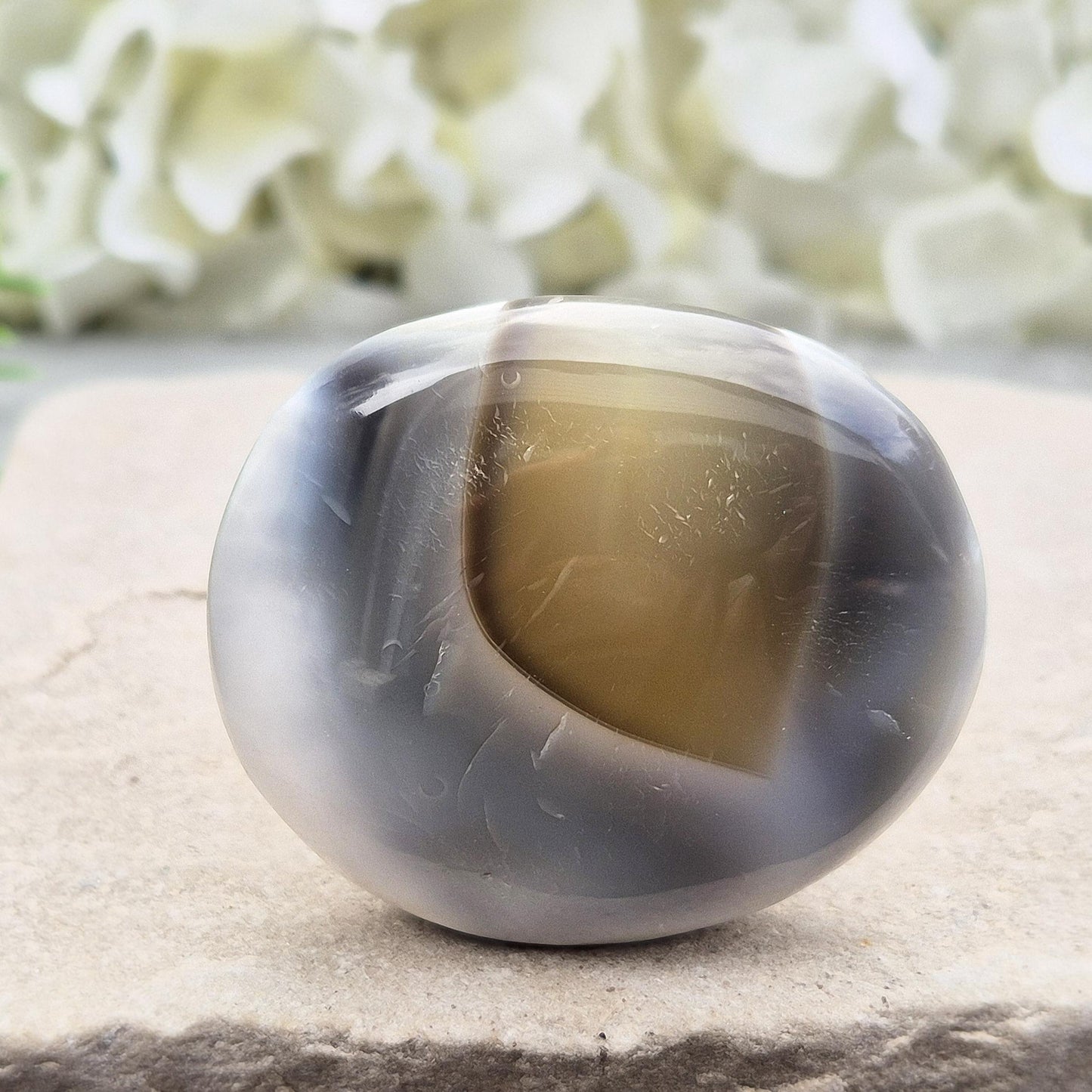 Orca Agate pebble from Madagascar. A rare crystal for emotional healing, forgiveness, inner strength, and support through life’s challenges.