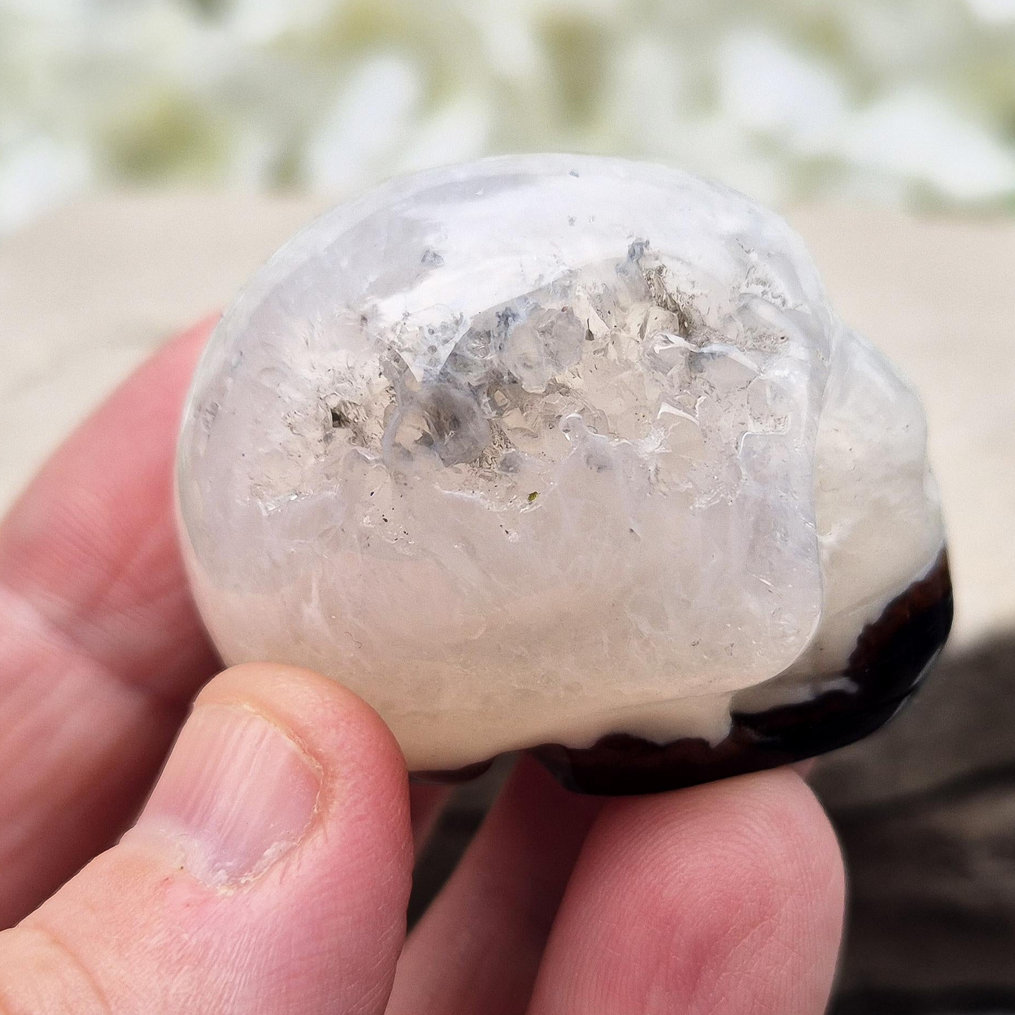Polished Sardonyx crystal skull. Grounding stone for strength, discipline and protection. Supports focus, stability and confident decision-making.