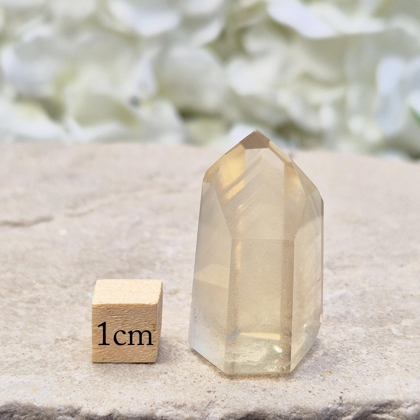 Natural pale honey Citrine point from Brazil with phantom inclusions. A unique crystal for manifestation, clarity, energy work, and spiritual growth.