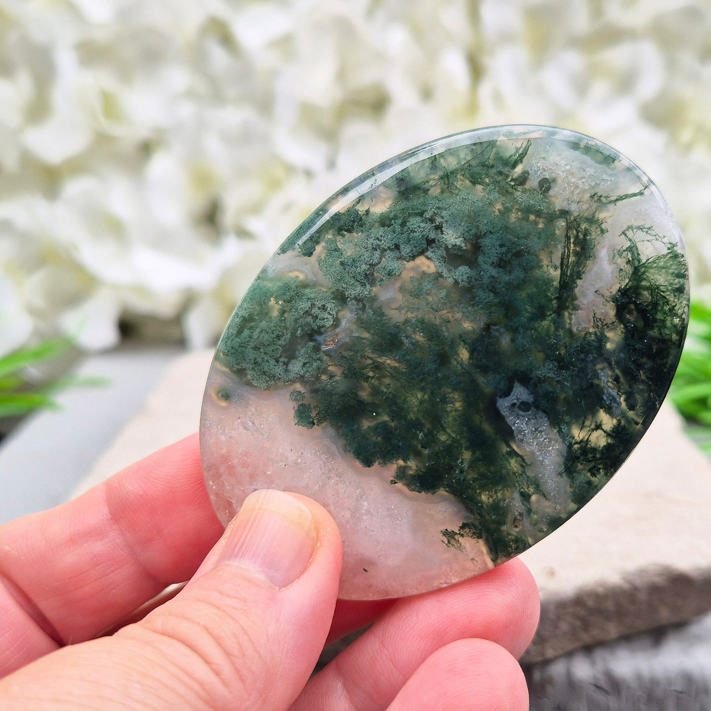 Polished Moss Agate palm stone. Known as a stone of nature, grounding and growth, it supports balance, stability and a calm, centred mind.