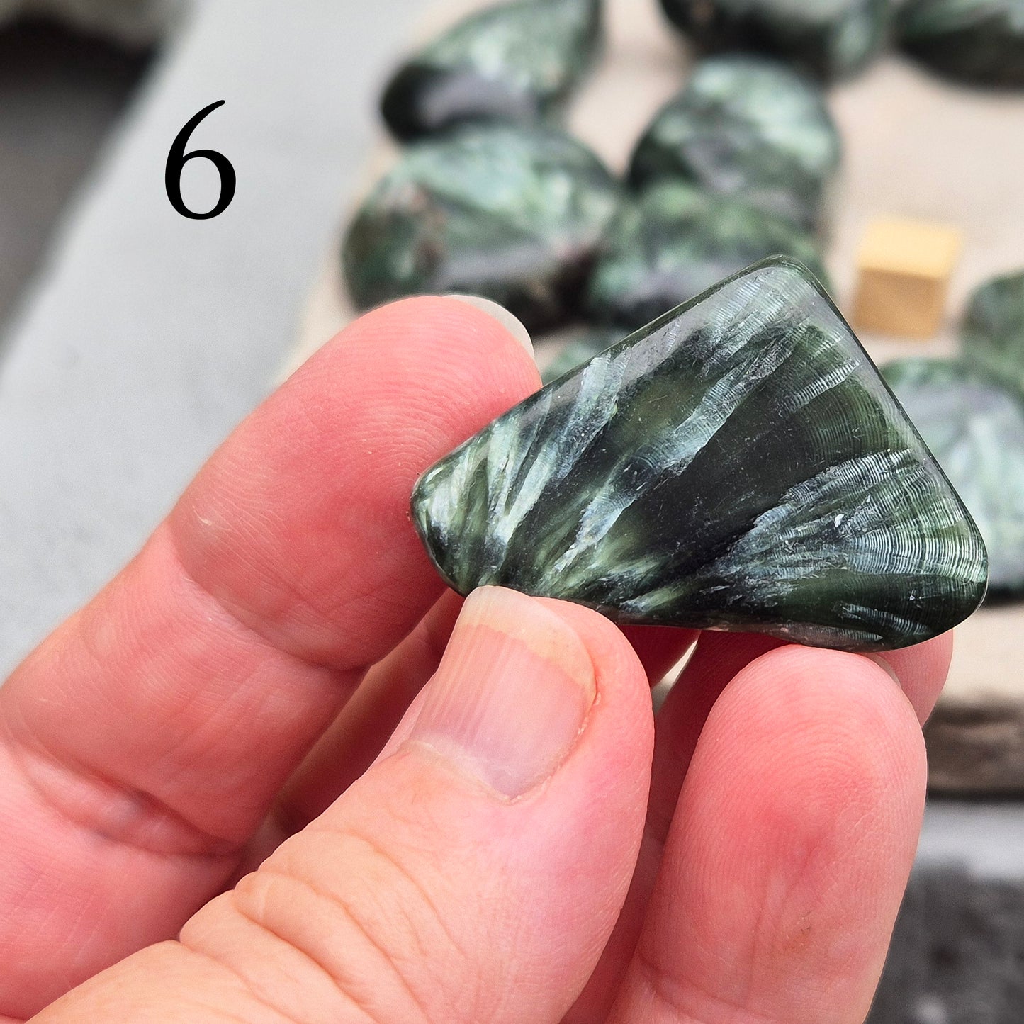 Beautiful AAA Seraphinite crystal from Siberia with feathery silver-green wings — a stone of divine connection, healing, and higher awareness.