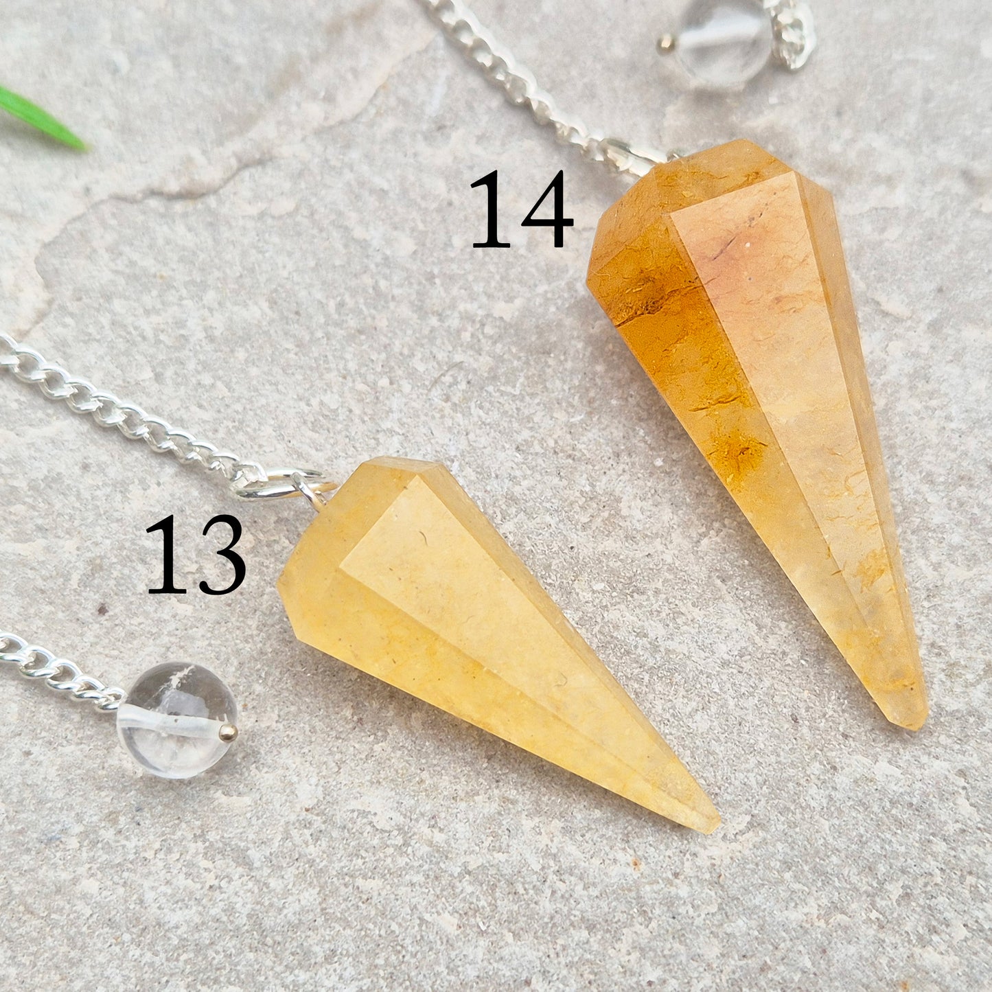 Golden Healer Quartz pendulum for energy work, dowsing, and intuitive guidance. Connects to gentle healing, balance, and spiritual growth.