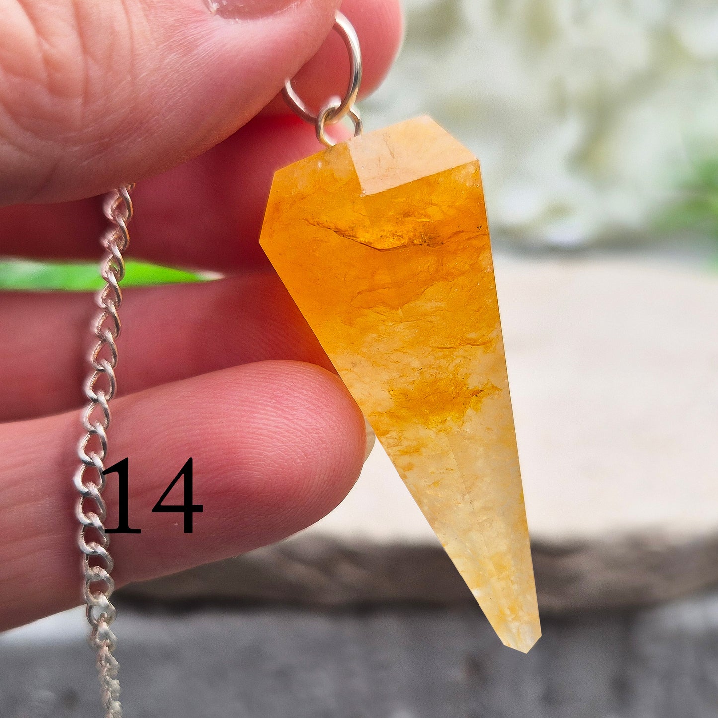 Golden Healer Quartz pendulum for energy work, dowsing, and intuitive guidance. Connects to gentle healing, balance, and spiritual growth.