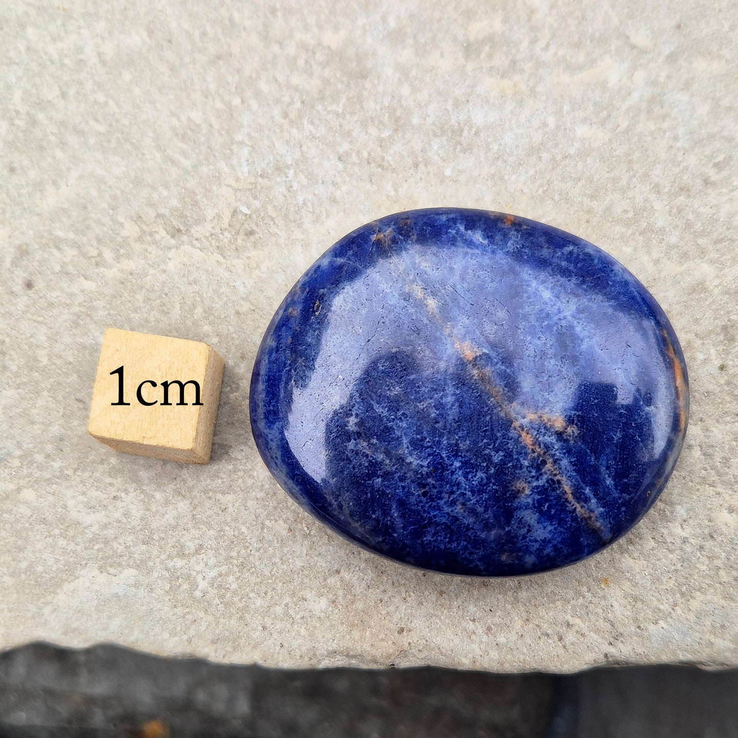 Calming Sodalite Palm Stone to ease the mind and support honest communication. Perfect for meditation, balance, and emotional peace.
