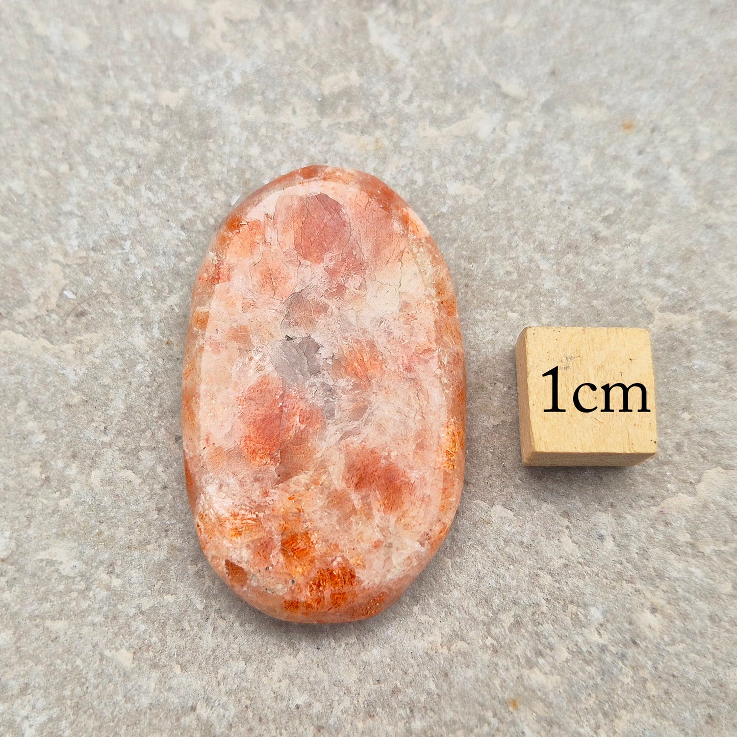 Sunstone Palm Stone – crystal of joy, vitality and confidence. Smooth and polished for meditation, energy work, or carrying uplifting energy with you.