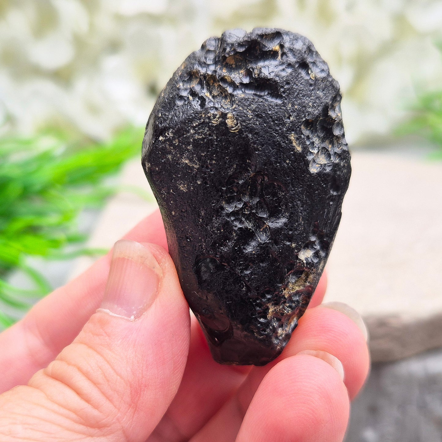 Powerful Black Tektite for grounding and transformation. A meteorite-born crystal that supports spiritual growth and energetic protection.