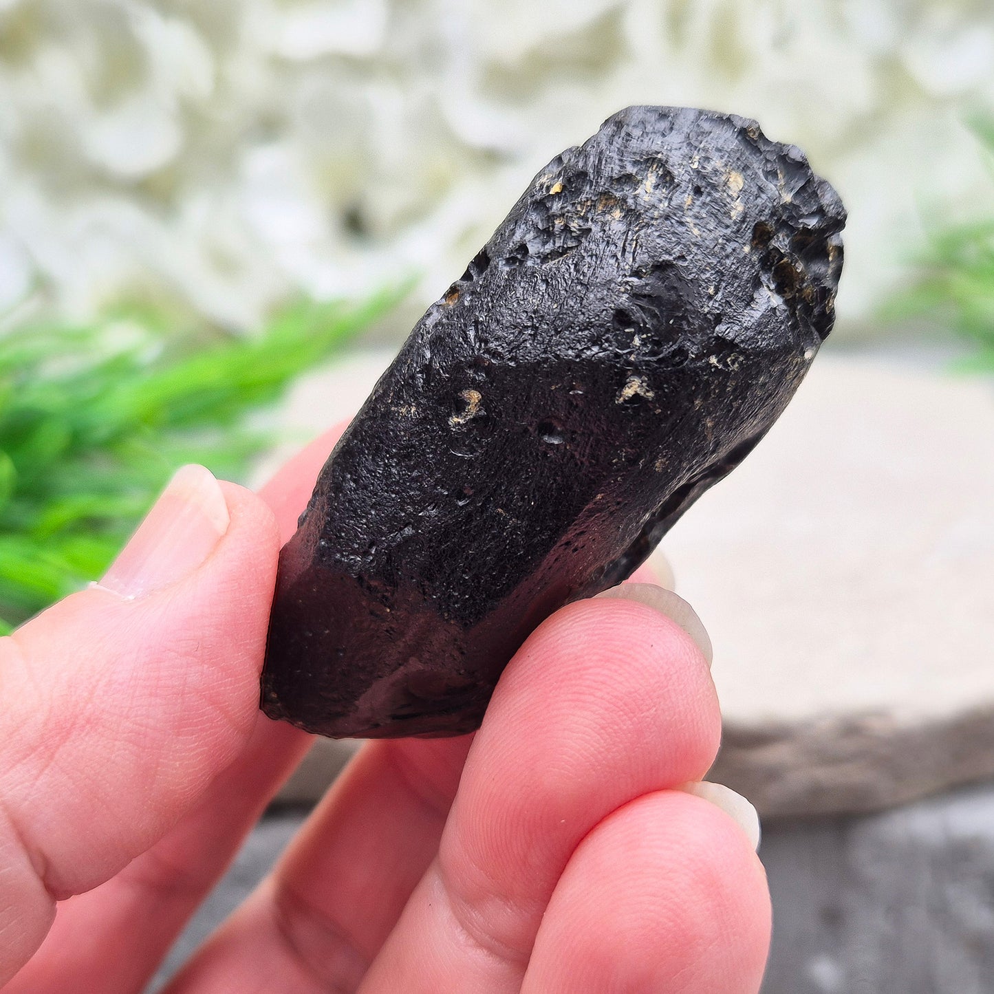 Powerful Black Tektite for grounding and transformation. A meteorite-born crystal that supports spiritual growth and energetic protection.