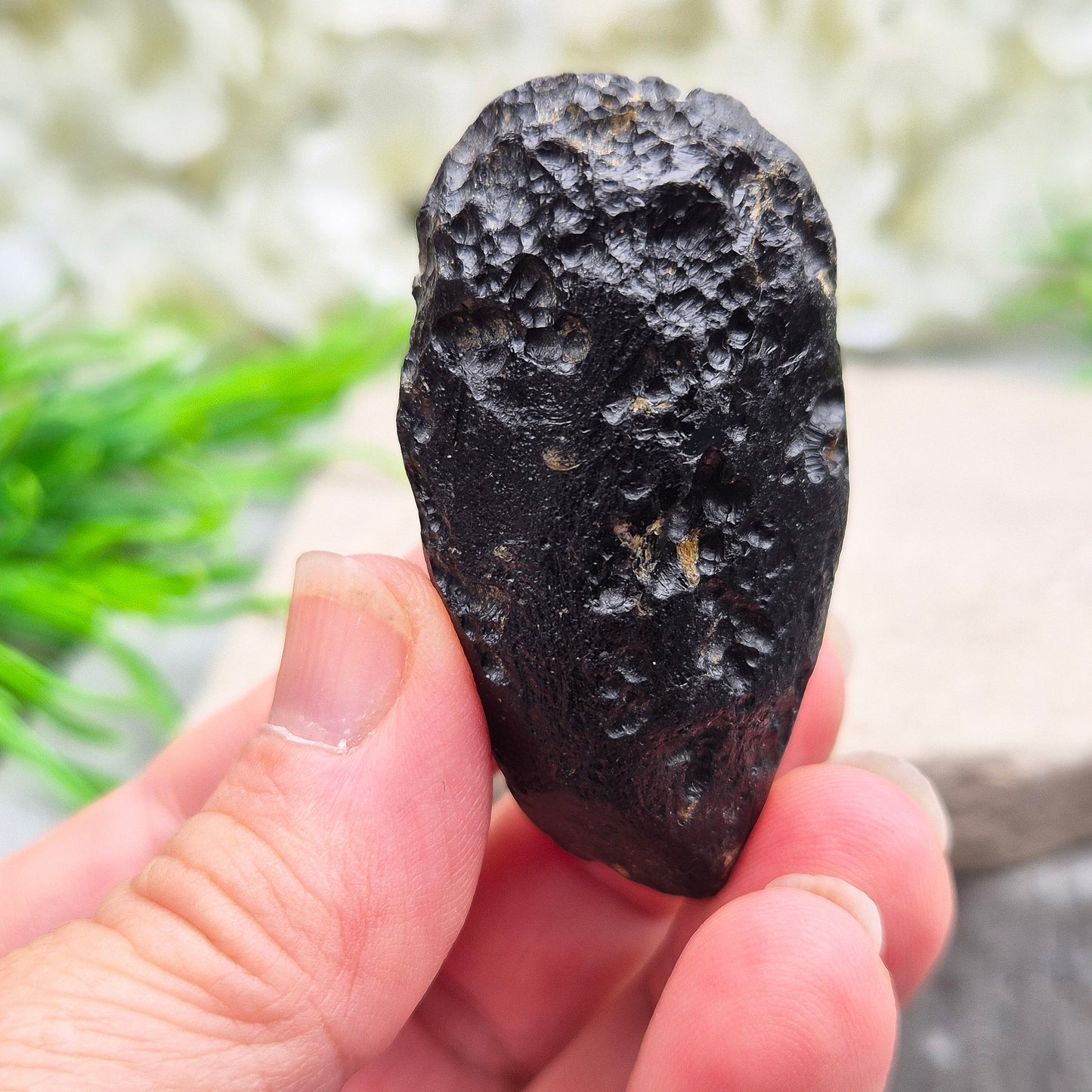 Powerful Black Tektite for grounding and transformation. A meteorite-born crystal that supports spiritual growth and energetic protection.