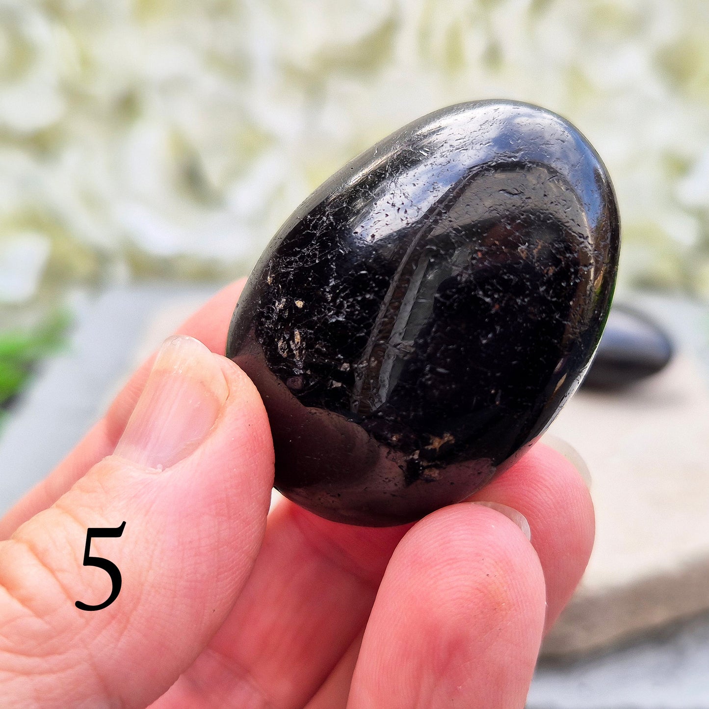 Black Tourmaline Palm Stone, Grounding and protective for everyday energy support. Ideal for shielding from negativity and promoting inner strength.